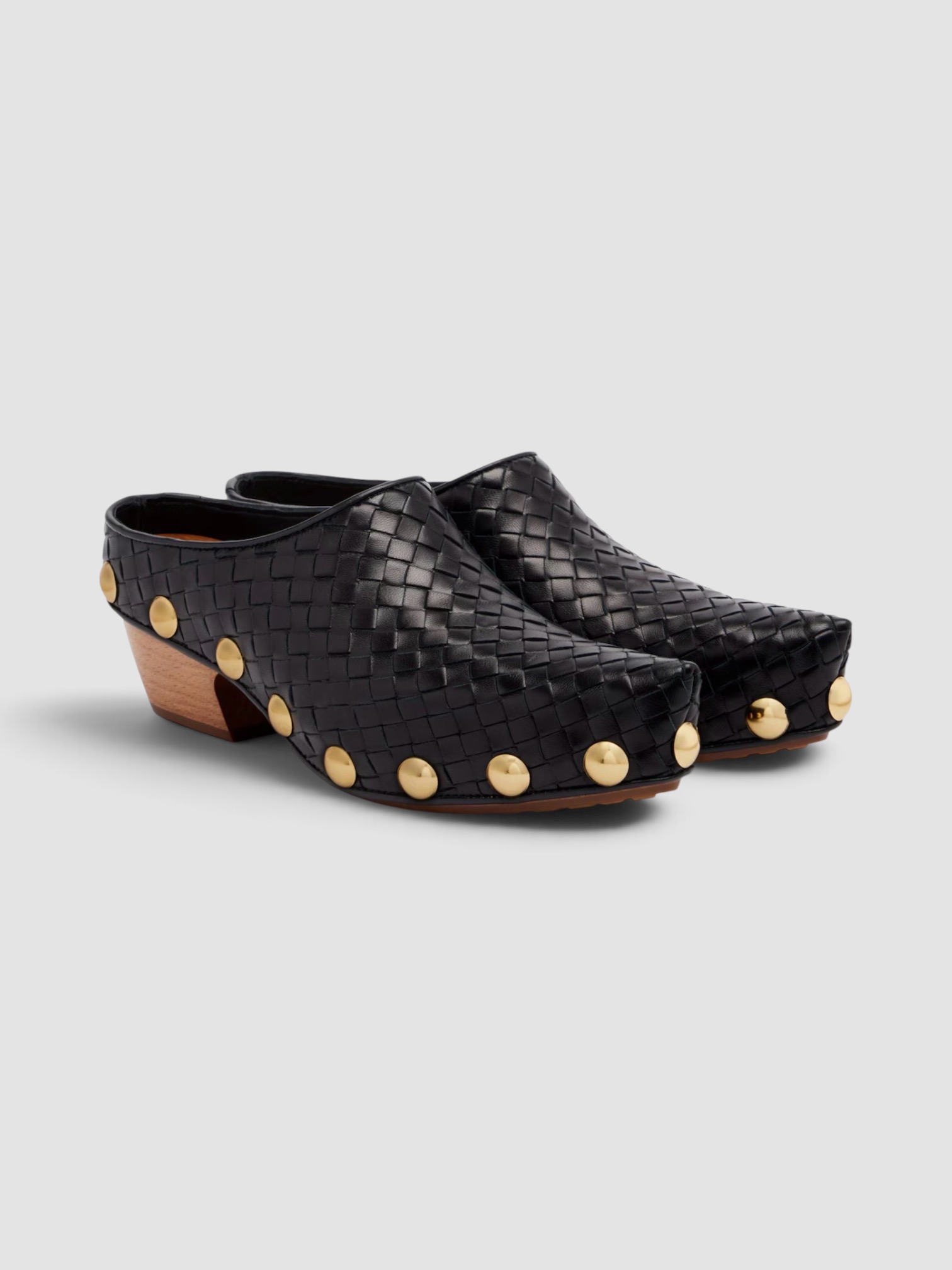 Bottega Veneta Gondola Intrecciato Studded Leather Clogs in black.