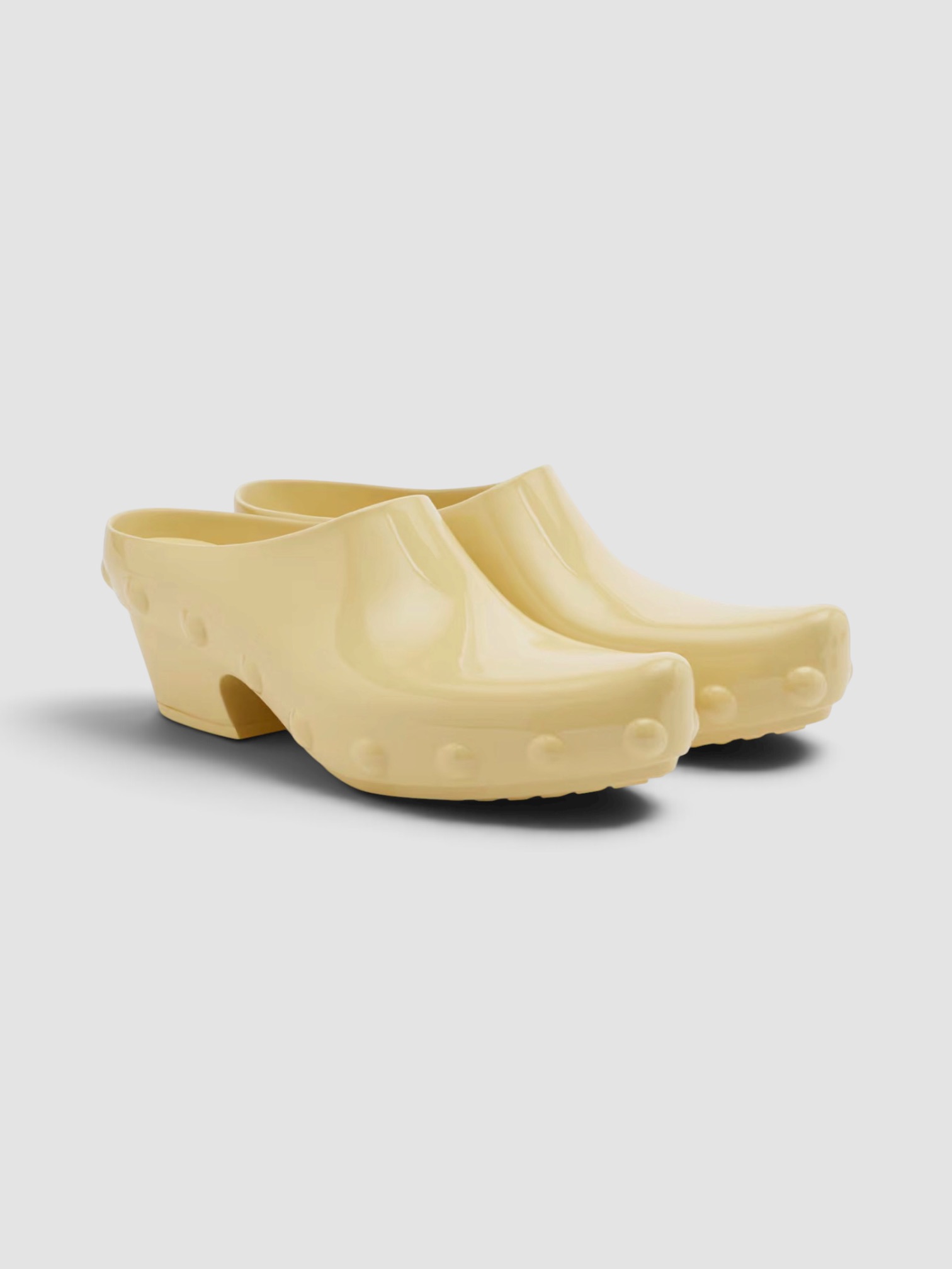 Bottega Veneta Gondola Mules in yellow.