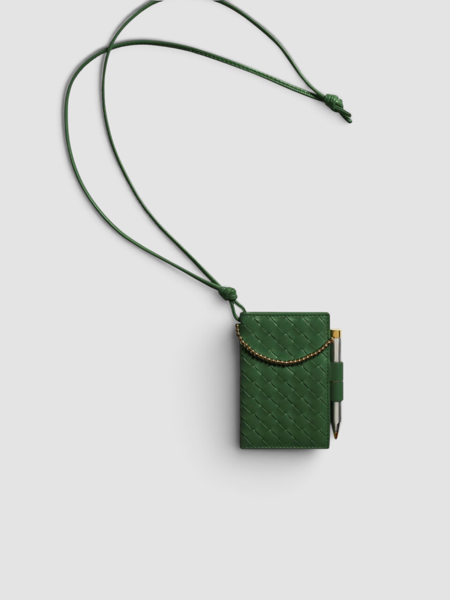 Bottega Veneta Intrecciato Piccolo Pencil Badge Holder in green.