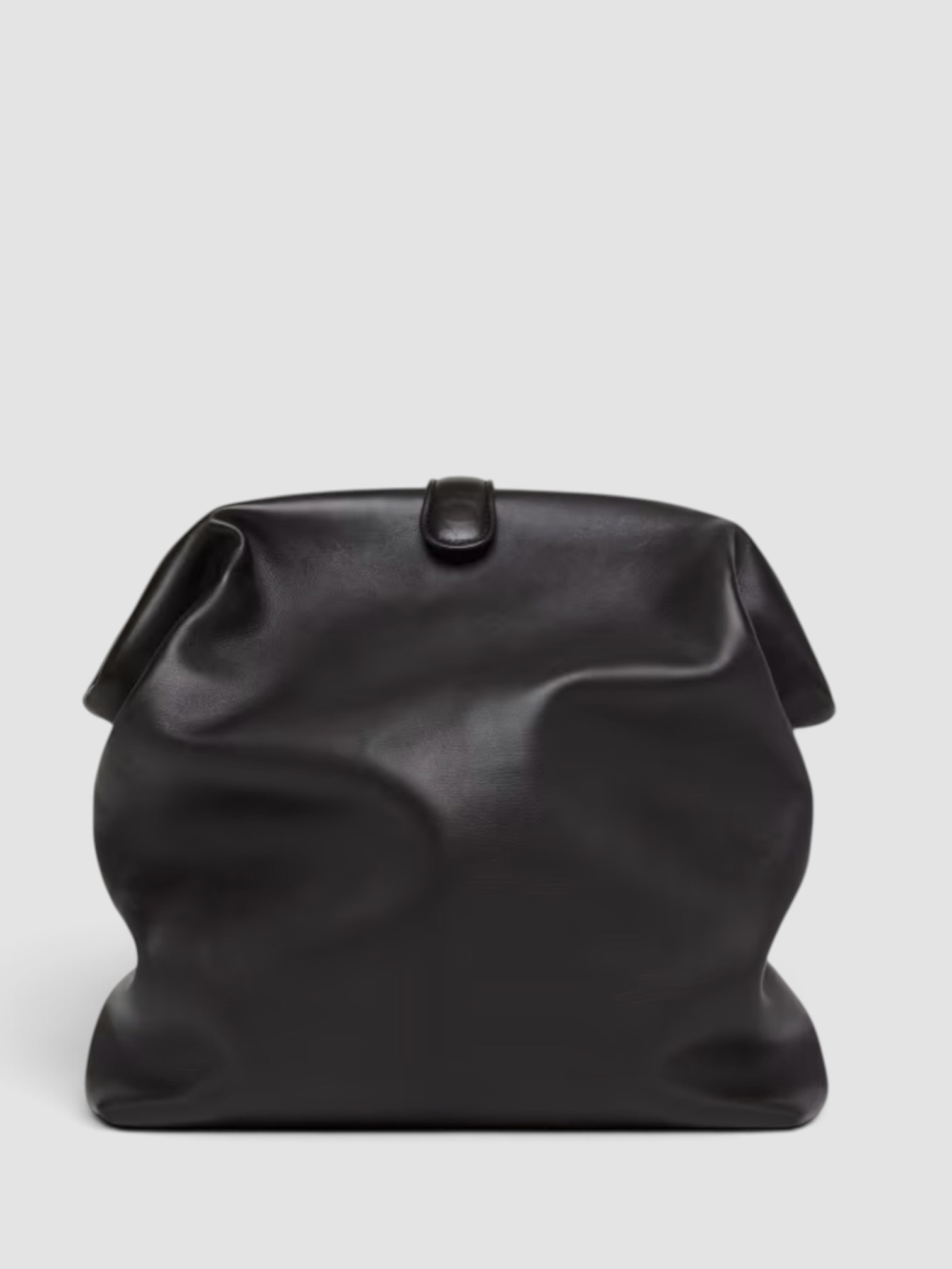 Bottega Veneta Lauren 1980 Leather Clutch Pouch Bag in espresso, worn with St. Agni Relaxed Tee Dress. Styled by Sharon Lombardo for FDV Concierge.