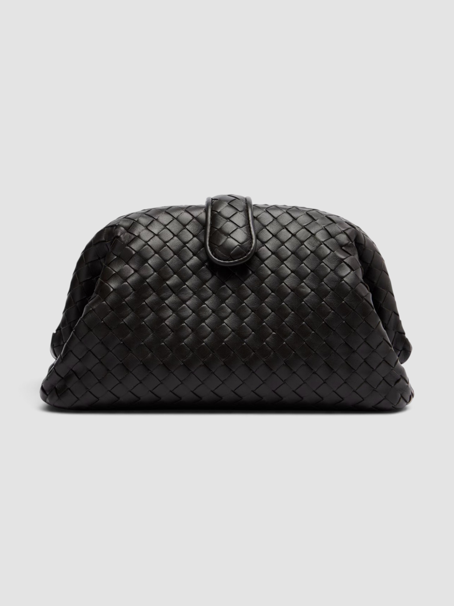 Bottega Veneta Lauren 1980 Small Leather Clutch in brown, worn with HEIRLOME Monica Dress. Styled by Sharon Lombardo for FDV Concierge.