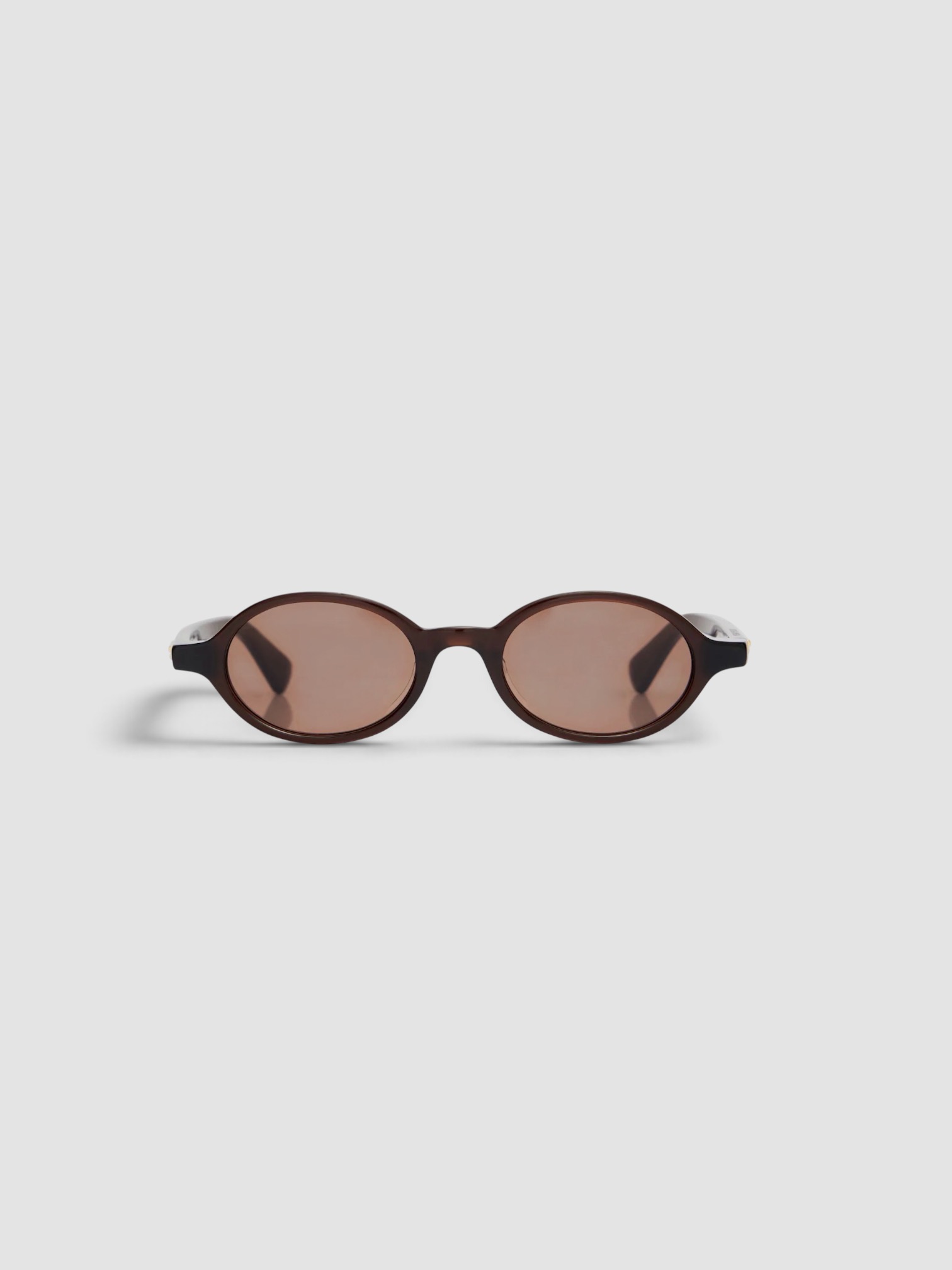 Bottega Veneta Slim Ribbon Oval Sunglasses in brown.