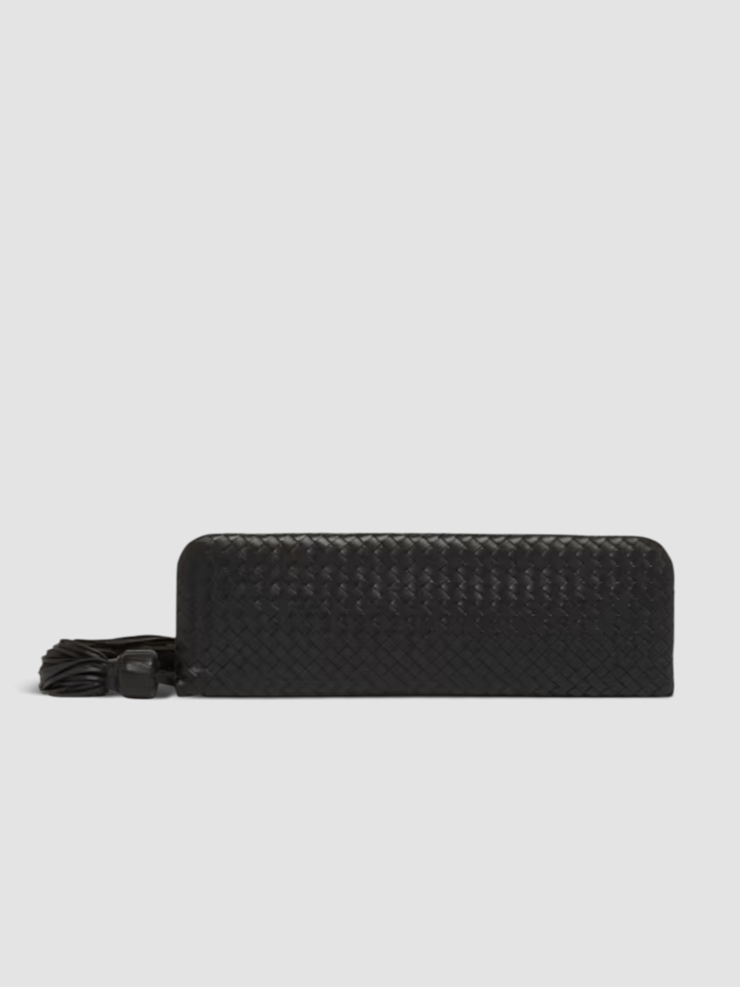 Bottega Veneta Tassel Nappa Leather Clutch Bag in black, worn with FIL DE VIE Isadora Dress. Styled by Sharon Lombardo for FDV Concierge.