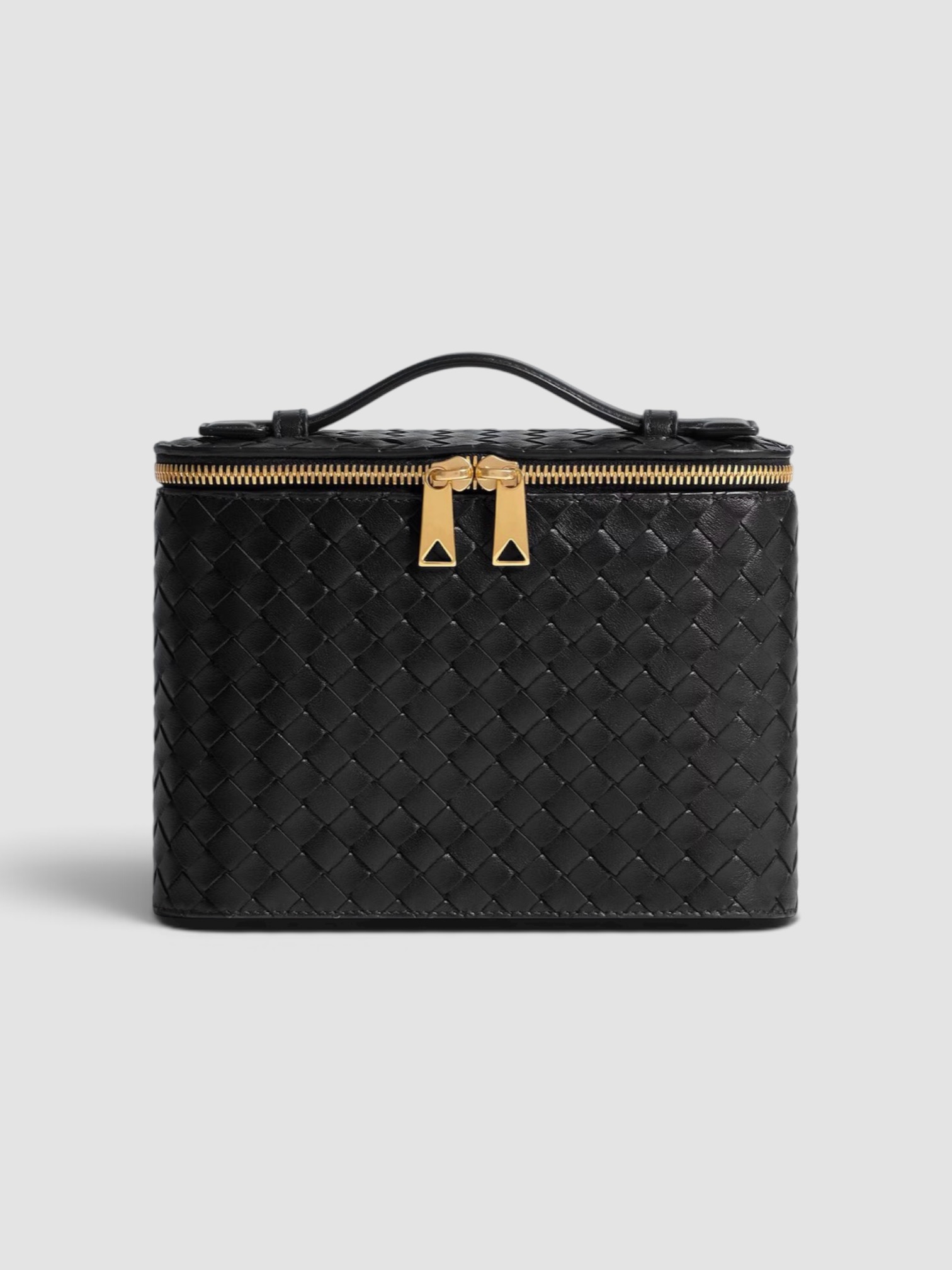 Bottega Veneta Vanity Case in black.