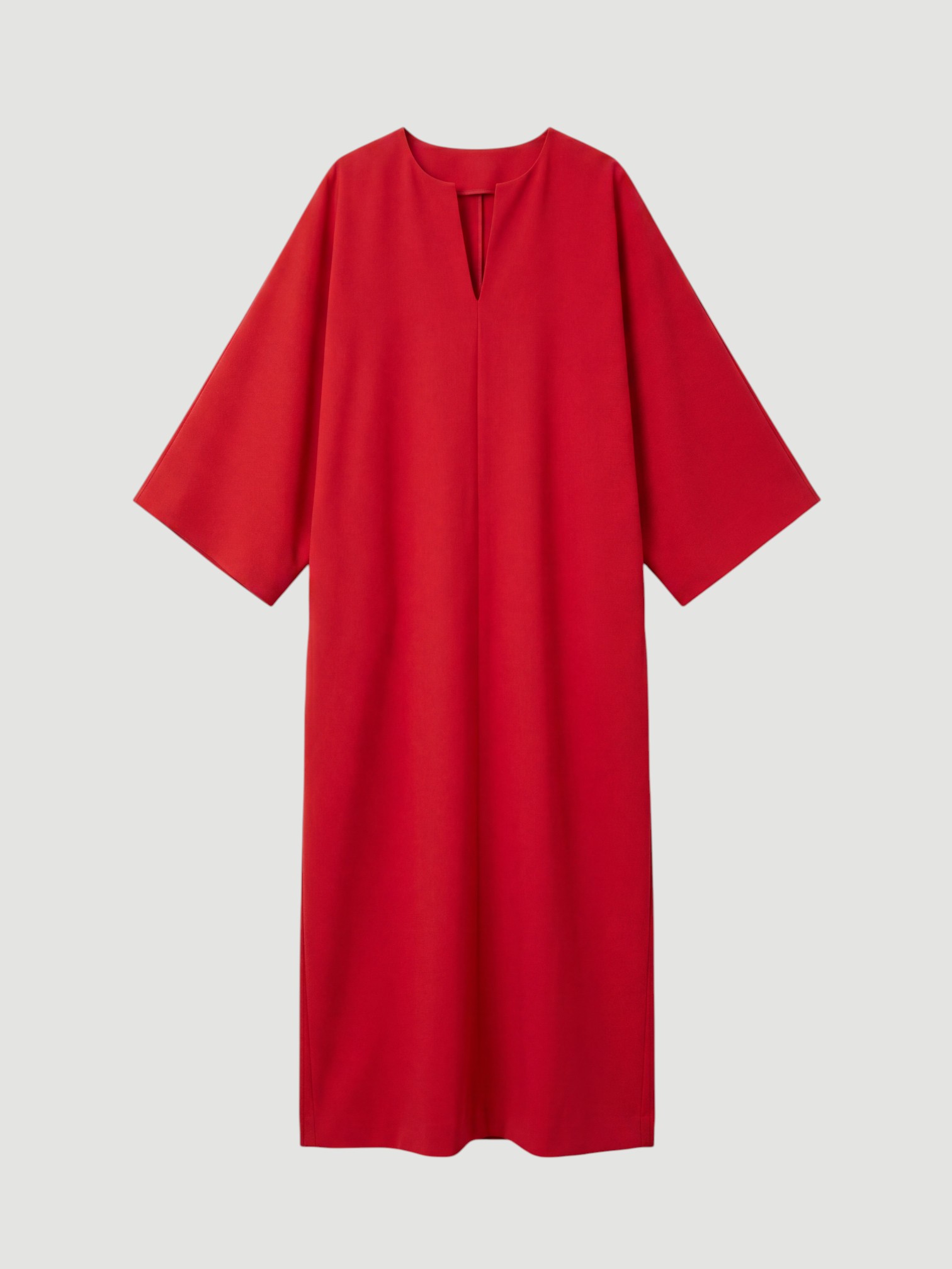 Bouguessa Nadia Kaftan in red, worn with Loewe Flamenco Two Tone Bag, Prada Patent Leather Thong Sandals. Styled by Sharon Lombardo for FDV Concierge.