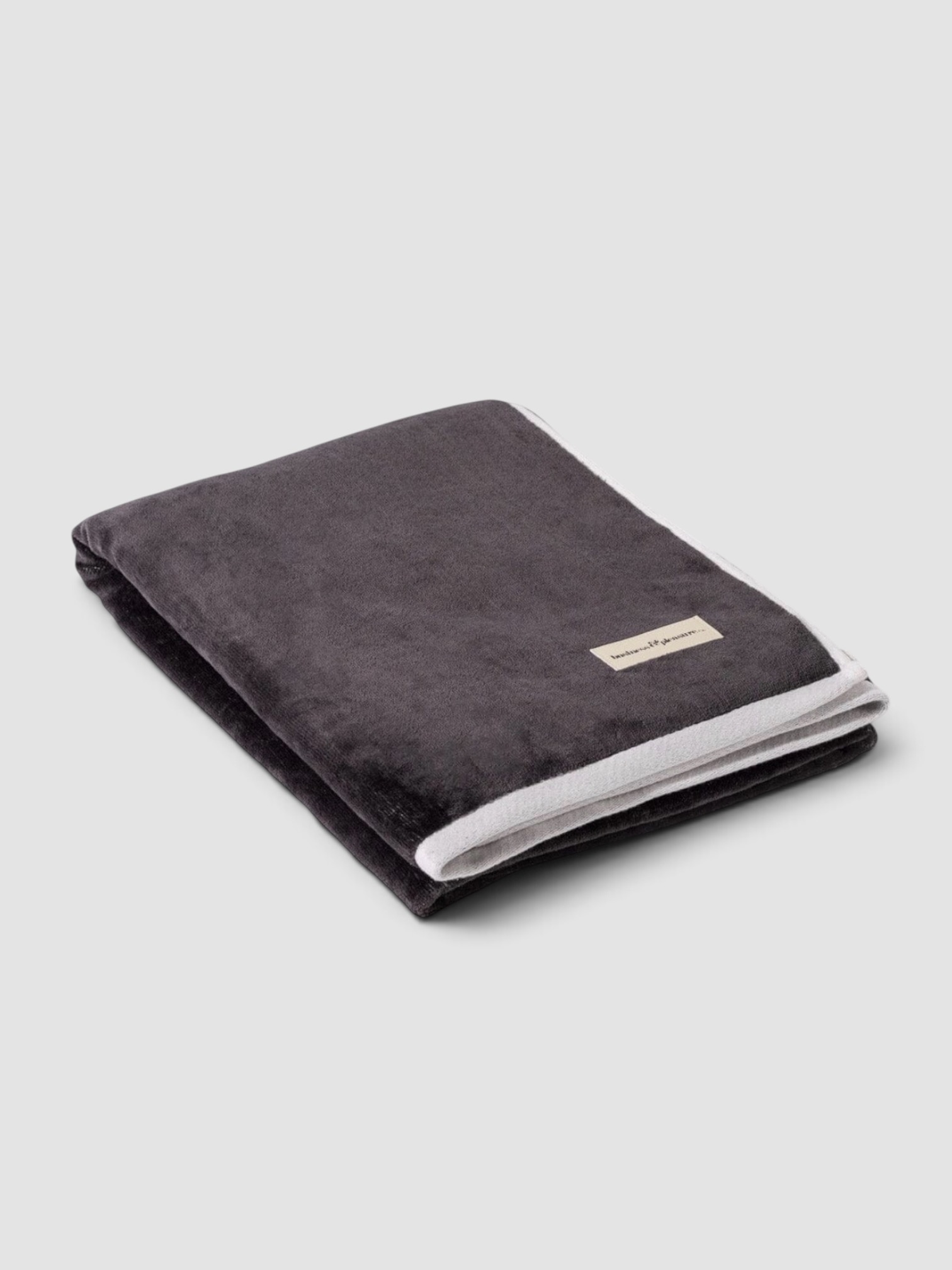 Business & Pleasure Co. Beach Towel in Black in black.