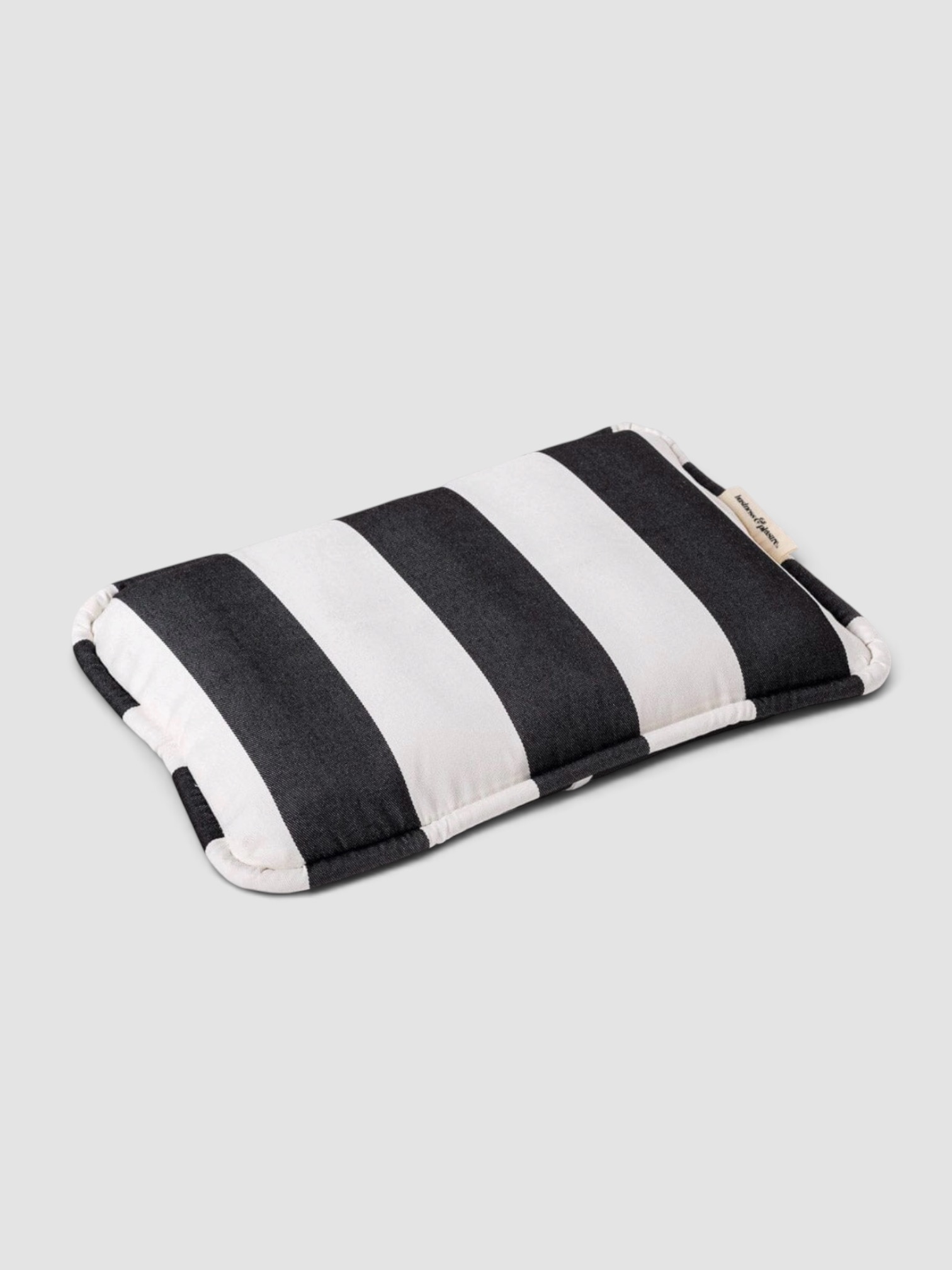 Business & Pleasure Co. The Inflatable Beach Pillow in Black in black.
