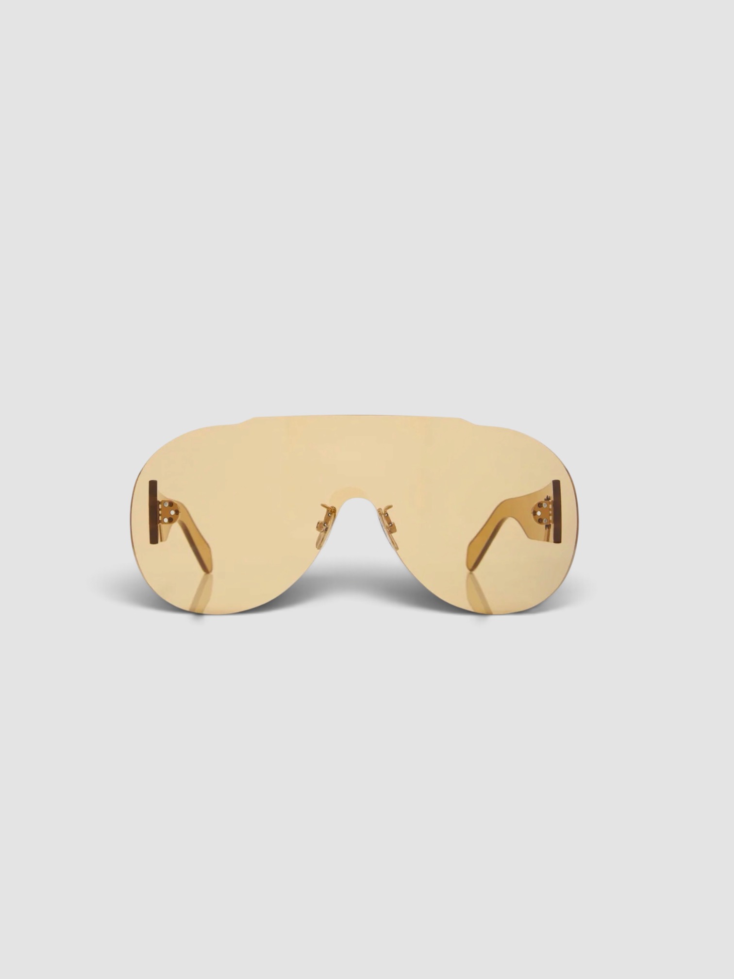 Celine Eyewear Sundown Shade Sunglasses in yellow.