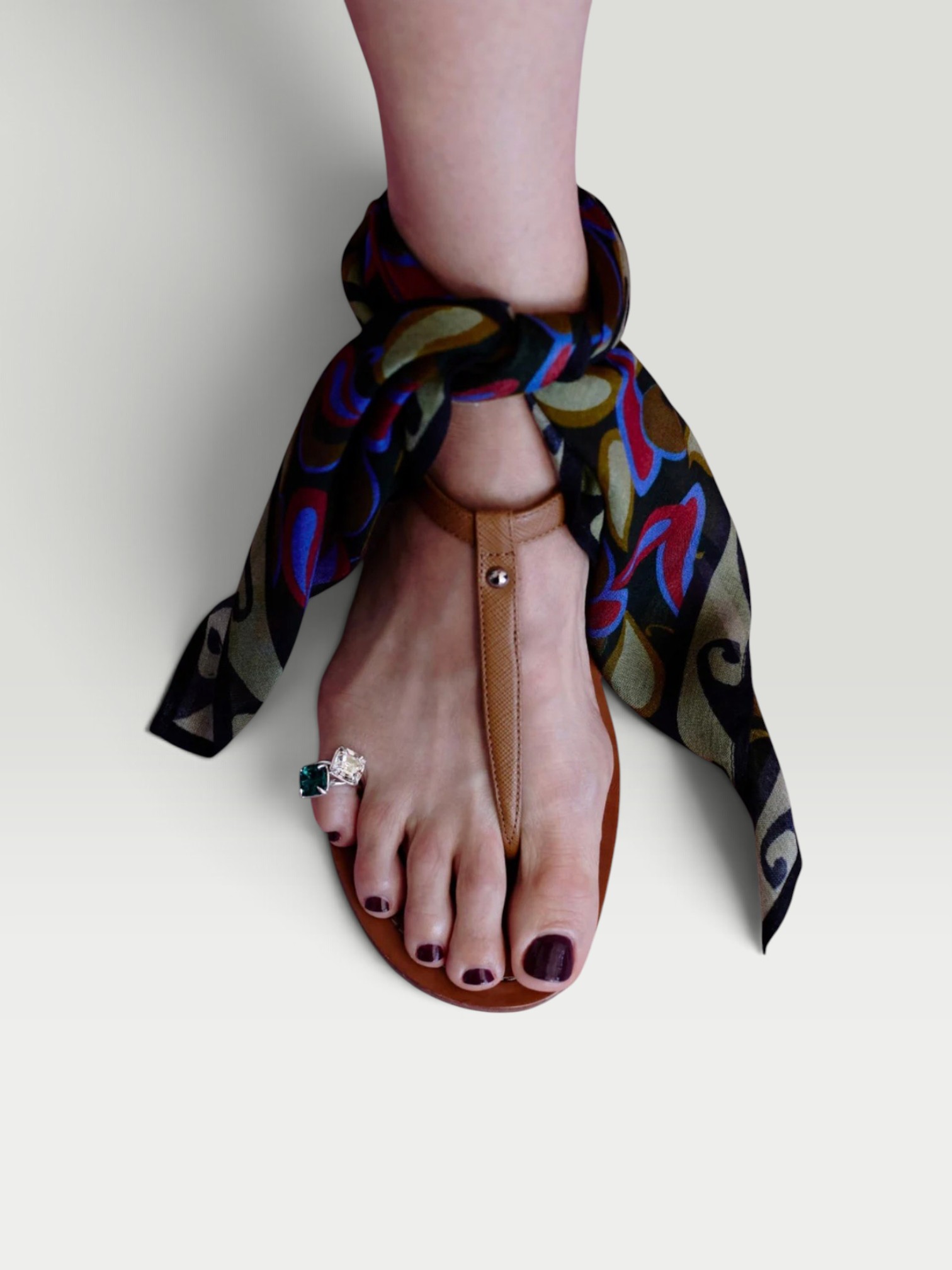 Chan Luu Duo Toe Ring in aqua, worn with All Three Kristen Rib Tank, Totême Wide Summer Trousers, St. Agni Fringed Leather Belt Skirt, Bottega Veneta Sampieri Flat Thong, on the water. Styled by Sharon Lombardo for FDV Concierge.