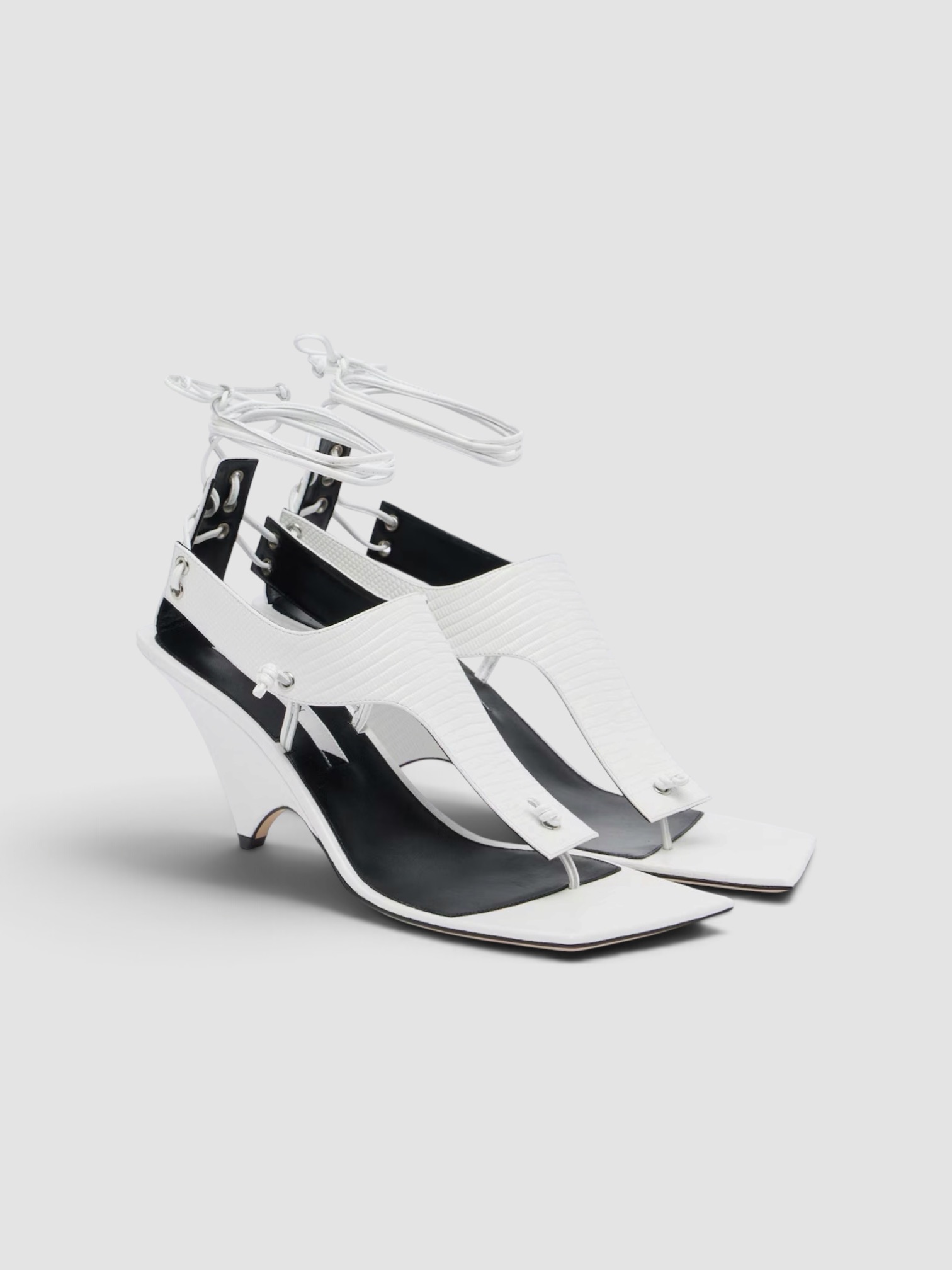 Christen Edge Leather Sandals in white.