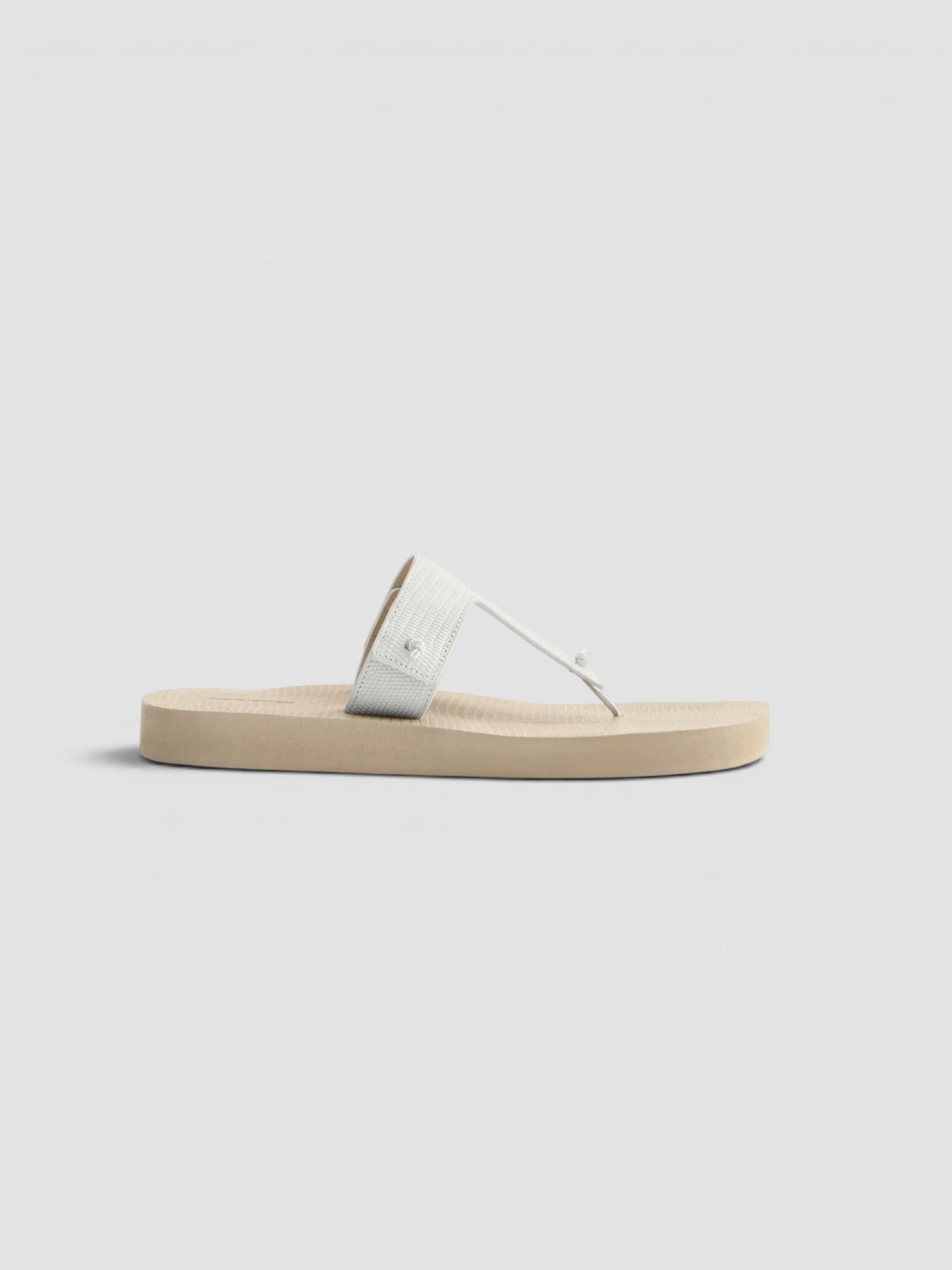 Christen Edge Lizard-Effect Leather Flip Flops in white.