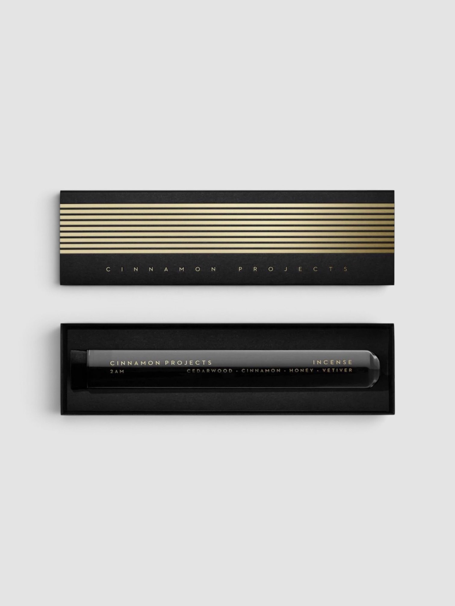 Cinnamon Projects 2 AM Incense in black.