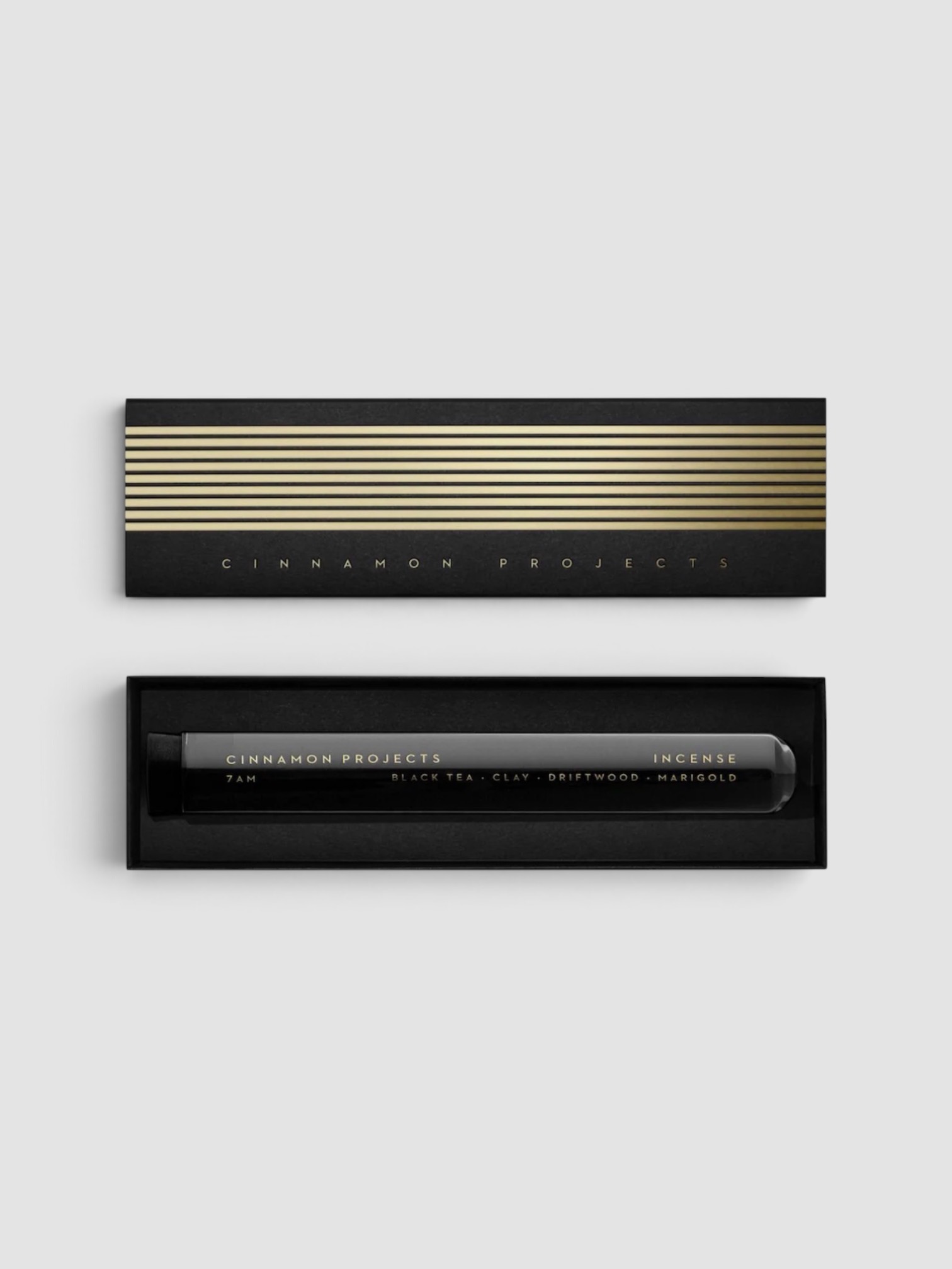 Cinnamon Projects 7 AM Incense in black.