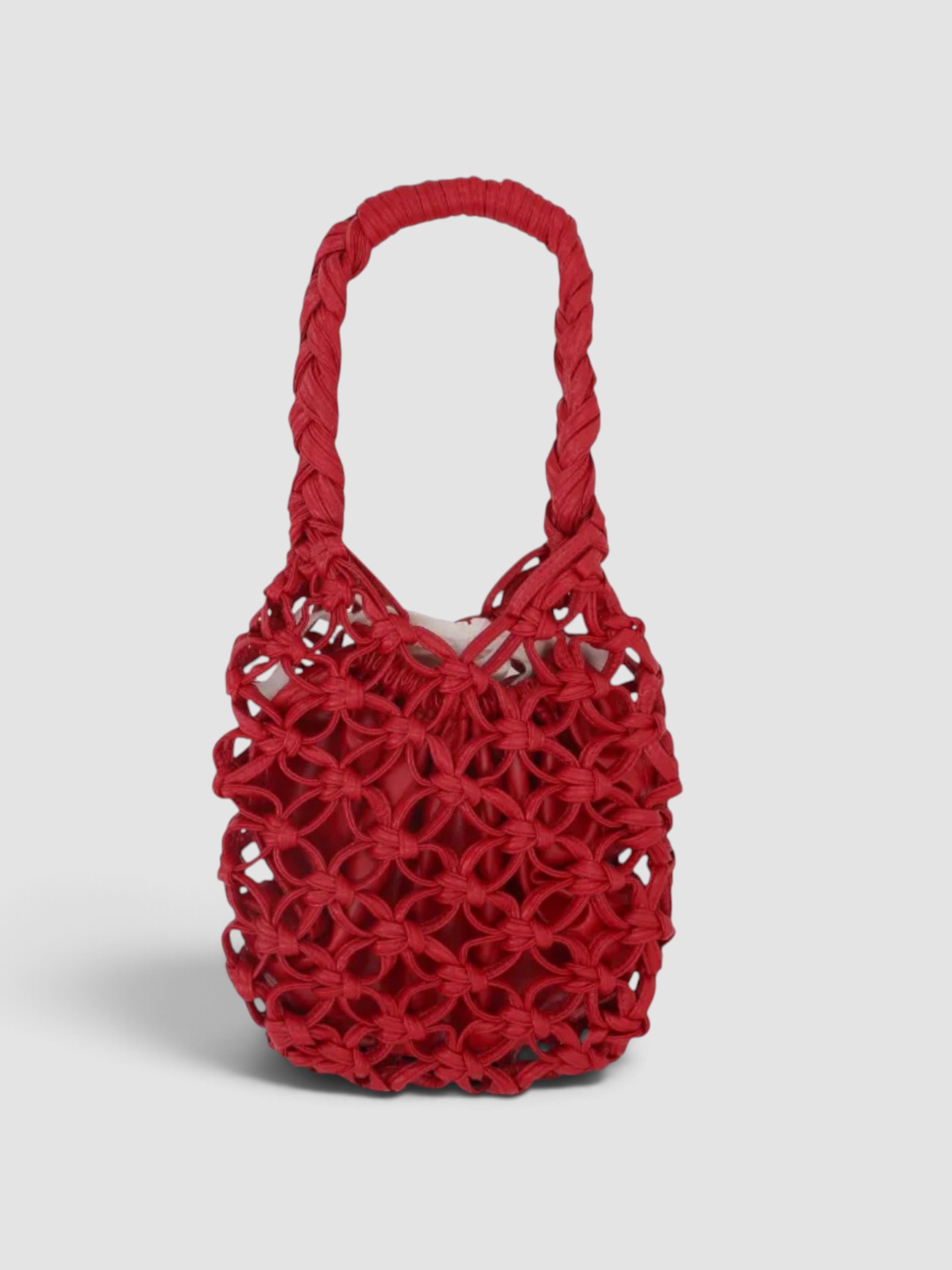 Comme des Garçons Comme des Garçons Knotted Shoulder Bag in cardinal red, worn with St. Agni Relaxed Tee Dress. Styled by Sharon Lombardo for FDV Concierge.