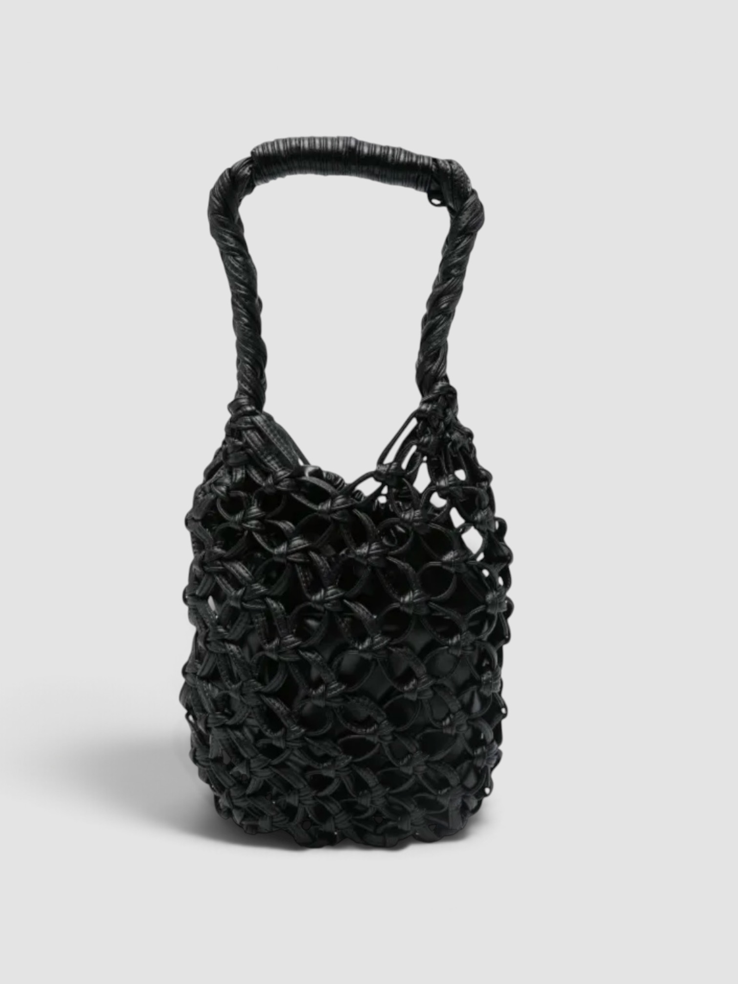 Comme des Garçons Comme des Garçons Openwork Tote Bag in black, worn with St. Agni Relaxed Tee Dress. Styled by Sharon Lombardo for FDV Concierge.