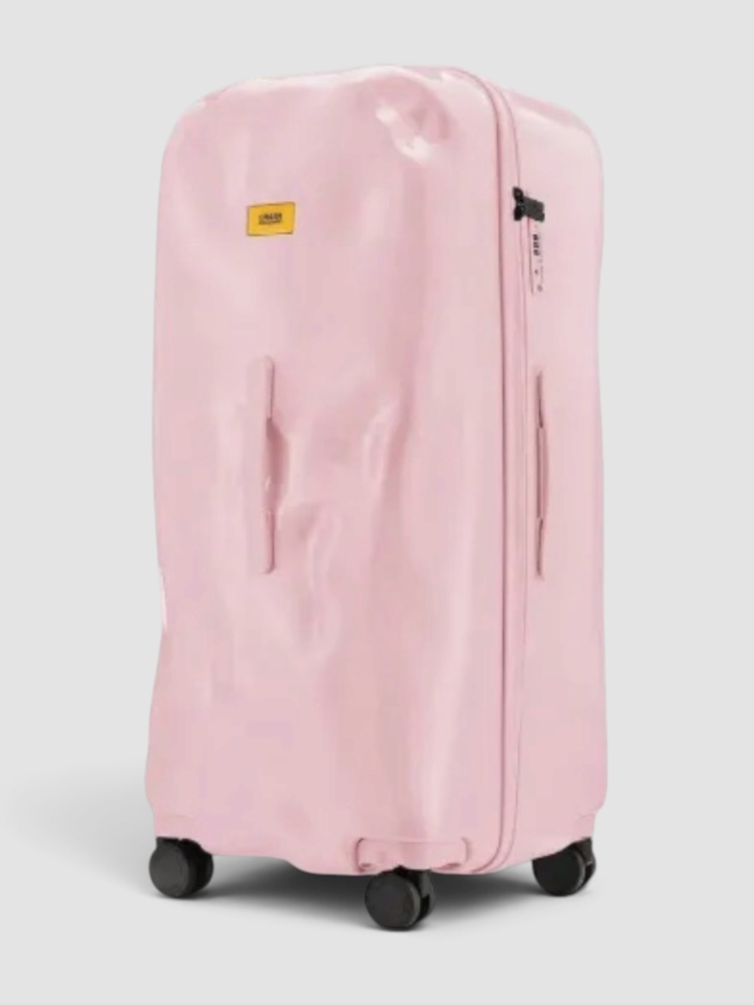 Crash Baggage Icon Deformed-Shell Holdall in pink.