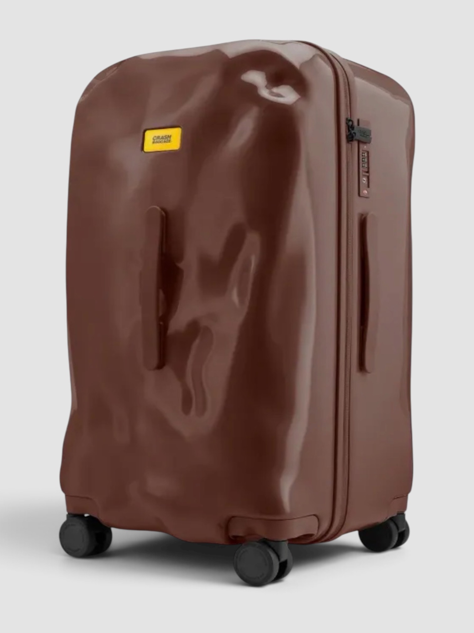 Crash Baggage Medium Trunk Dented-Effect in brown.
