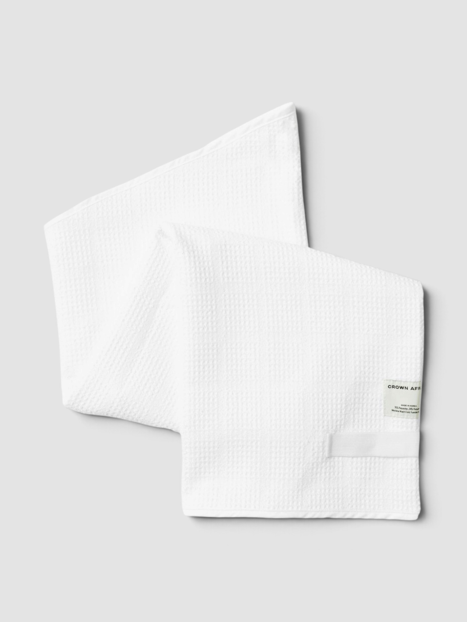 Crown Affair The Towel in white.