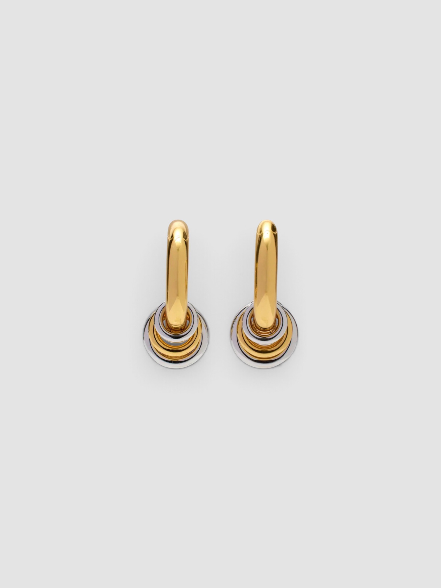 Dehanche Revenge Hoop Earrings in gold.