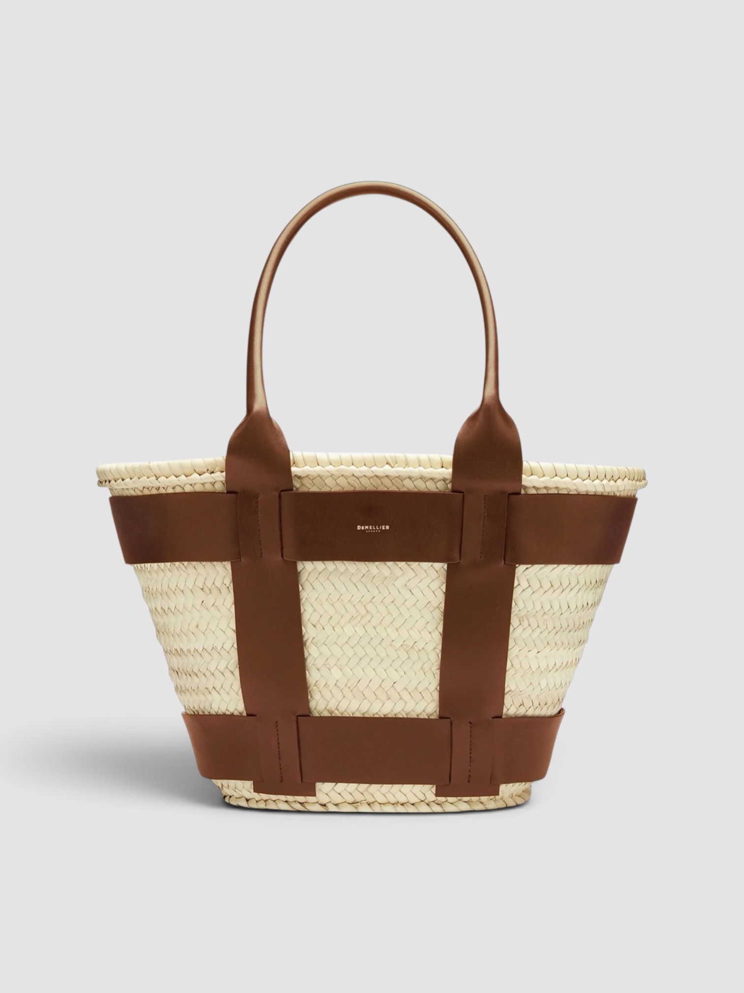 Demellier London Santorini Basket Bag in brown, worn with Totême Striped Shirtdress. Styled by Sharon Lombardo for FDV Concierge.