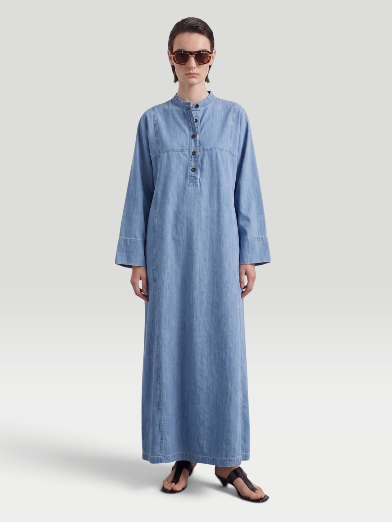 Dries Van Noten Denim Maxi Dress in blue, worn with Birkenstock Arizona Droplet High Shine. Styled by Sharon Lombardo for FDV Concierge.