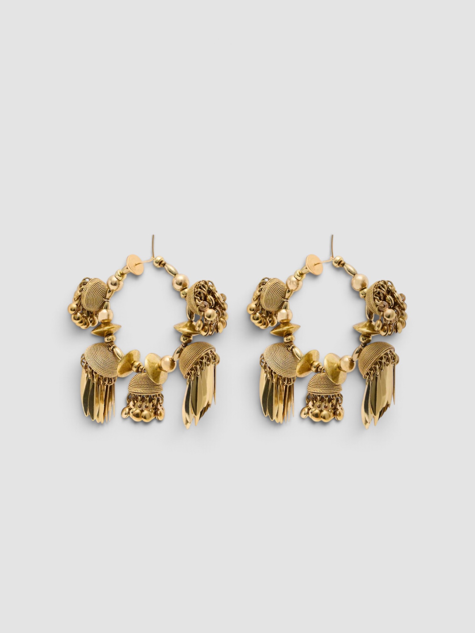 Dries Van Noten Embellished Hoop Earrings in gold, worn with Éliou For FWRD Baia Romper, Phoebe Philo Peak Sunglasses, Dries Van Noten Embellished Pendant Necklace, Phoebe Philo Frizz Flip Flop. Styled by Sharon Lombardo for FDV Concierge.