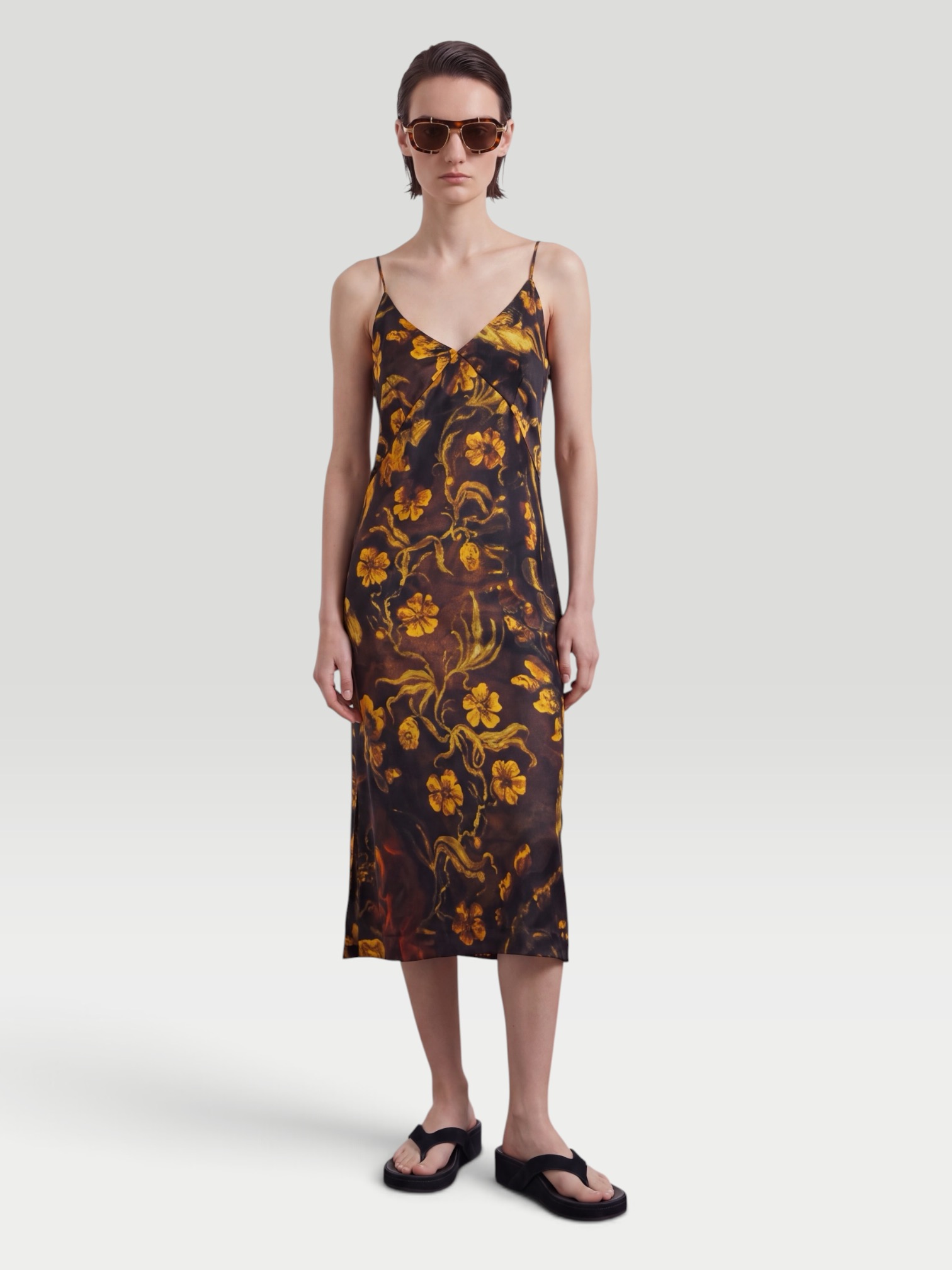 Dries Van Noten Floral Midi Dress in black, worn with Alaïa Heel Thong Mules in Velvet. Styled by Sharon Lombardo for FDV Concierge.