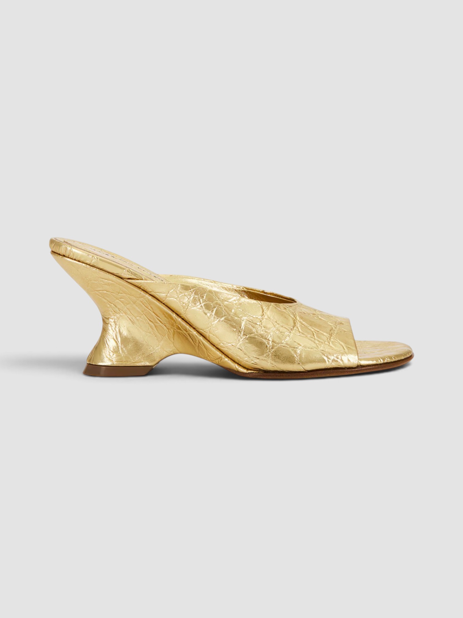 Dries Van Noten Mule Sandal in gold.