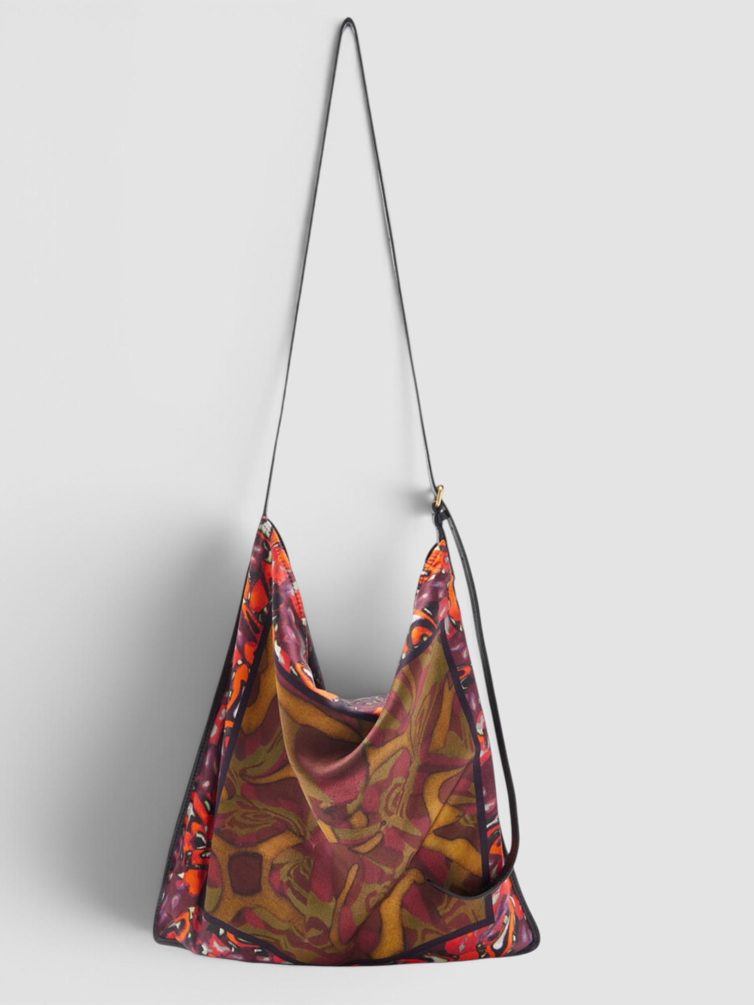 Dries Van Noten Scarf Bag in rust, worn with Rabanne Chainmail Embellished Cocktail Dress. Styled by Sharon Lombardo for FDV Concierge.