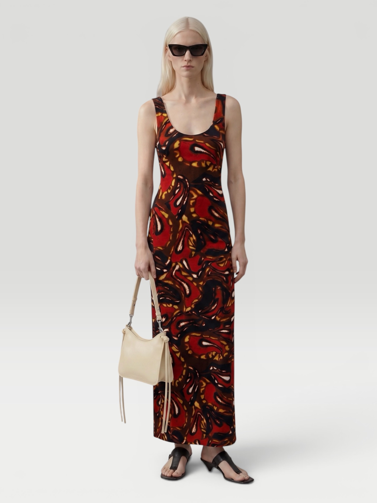 Dries Van Noten Debant Printed Maxi Dress in rust, worn with Dries Van Noten Flat Sandal. Styled by Sharon Lombardo for FDV Concierge.