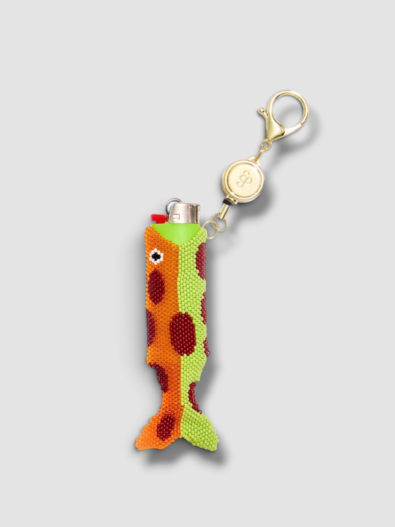 Edie Parker Beaded Fish Retractable Lighter Keychain in green.