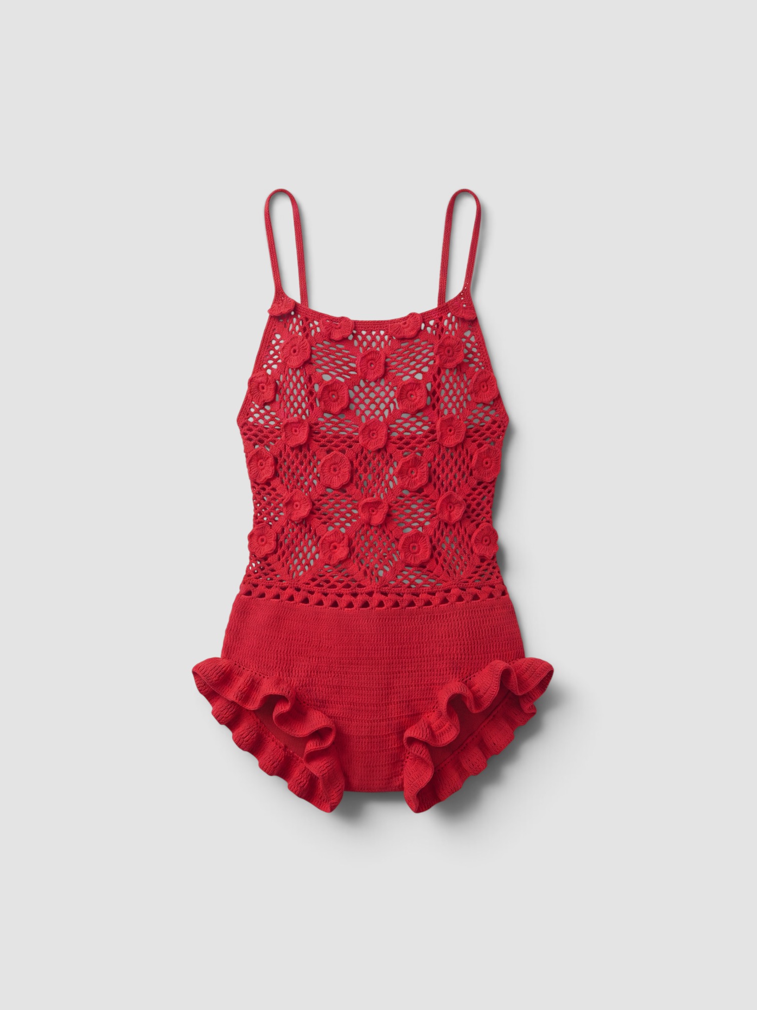 Éliou For FWRD Baia Romper in cherry, worn with Phoebe Philo Peak Sunglasses, Dries Van Noten Embellished Hoop Earrings, Dries Van Noten Embellished Pendant Necklace, Phoebe Philo Frizz Flip Flop. Styled by Sharon Lombardo for FDV Concierge.