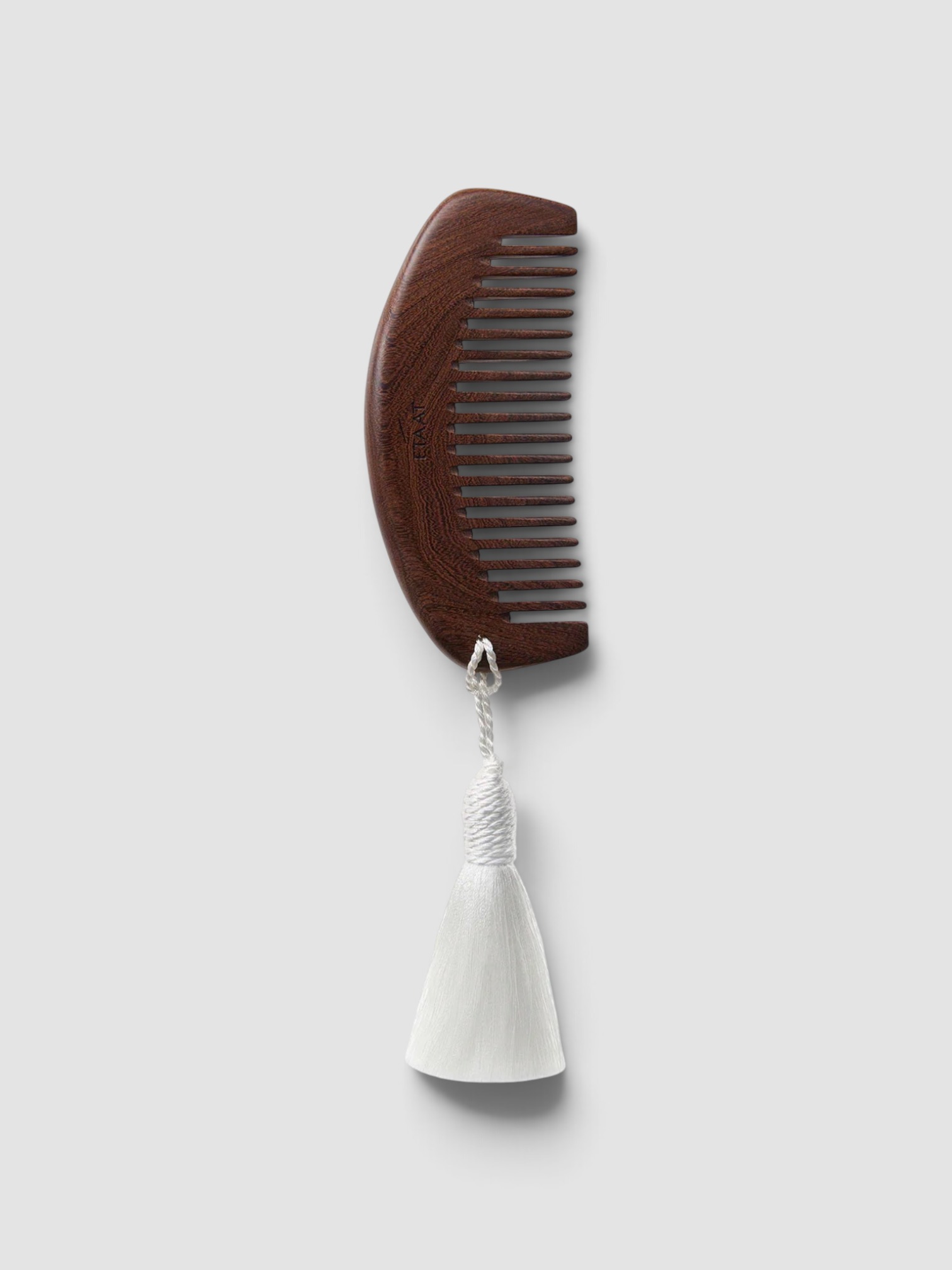 ETAAT Joon The Mini Comb in natural sandalwood.