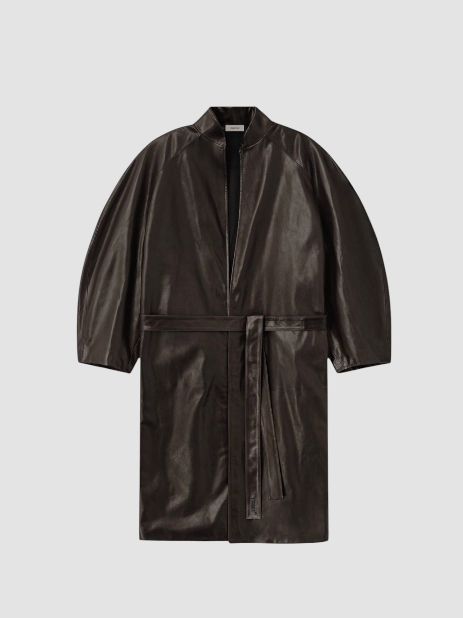 Fear Of God Women's Leather Coat in espresso, worn with Jil Sander Envers Satin Trousers, Birkenstock Mayari. Styled by Sharon Lombardo for FDV Concierge.