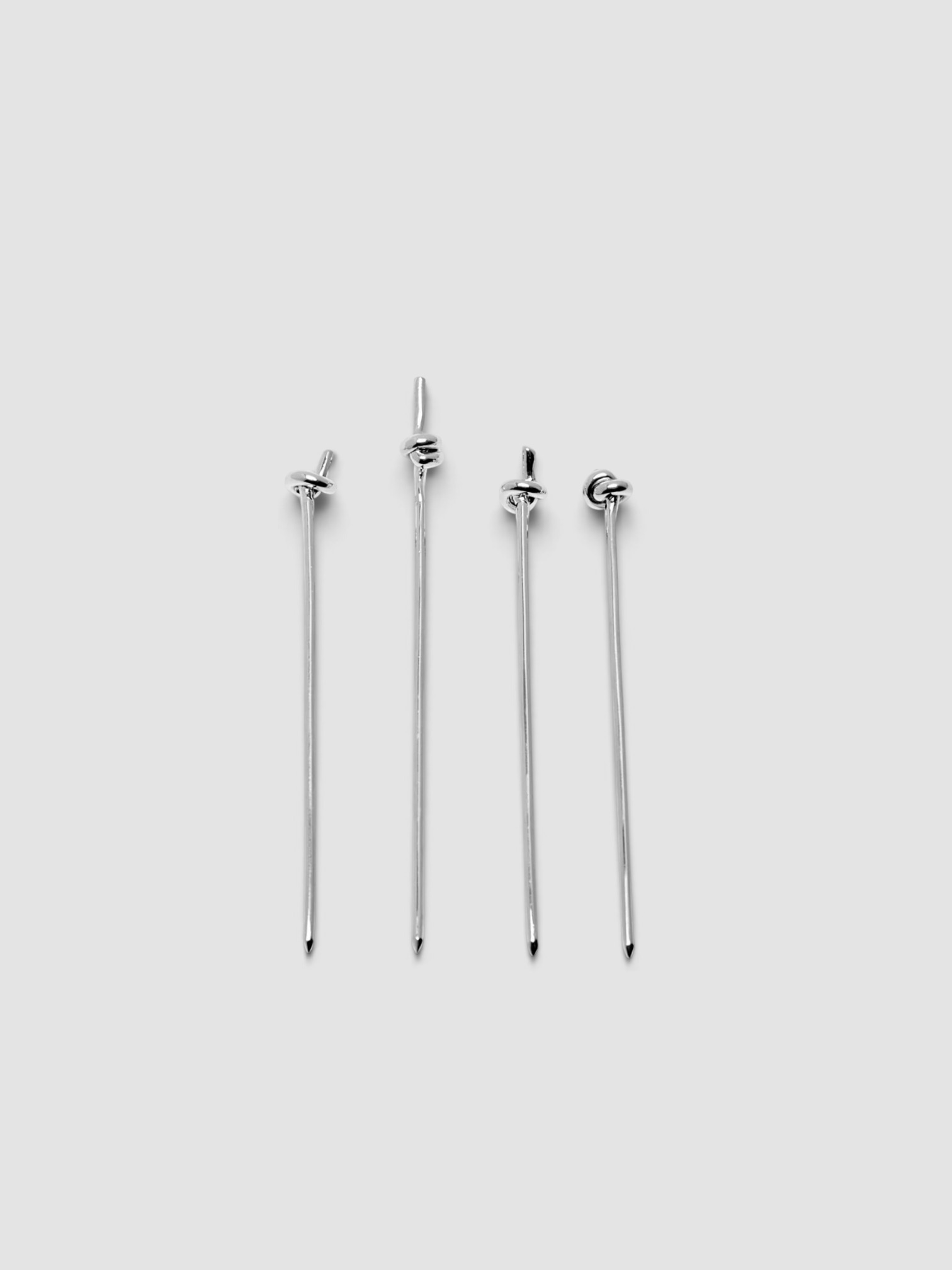 Heath Wagoner Knot Sterling Silver Cocktail Picks, Set of 4 in silver.