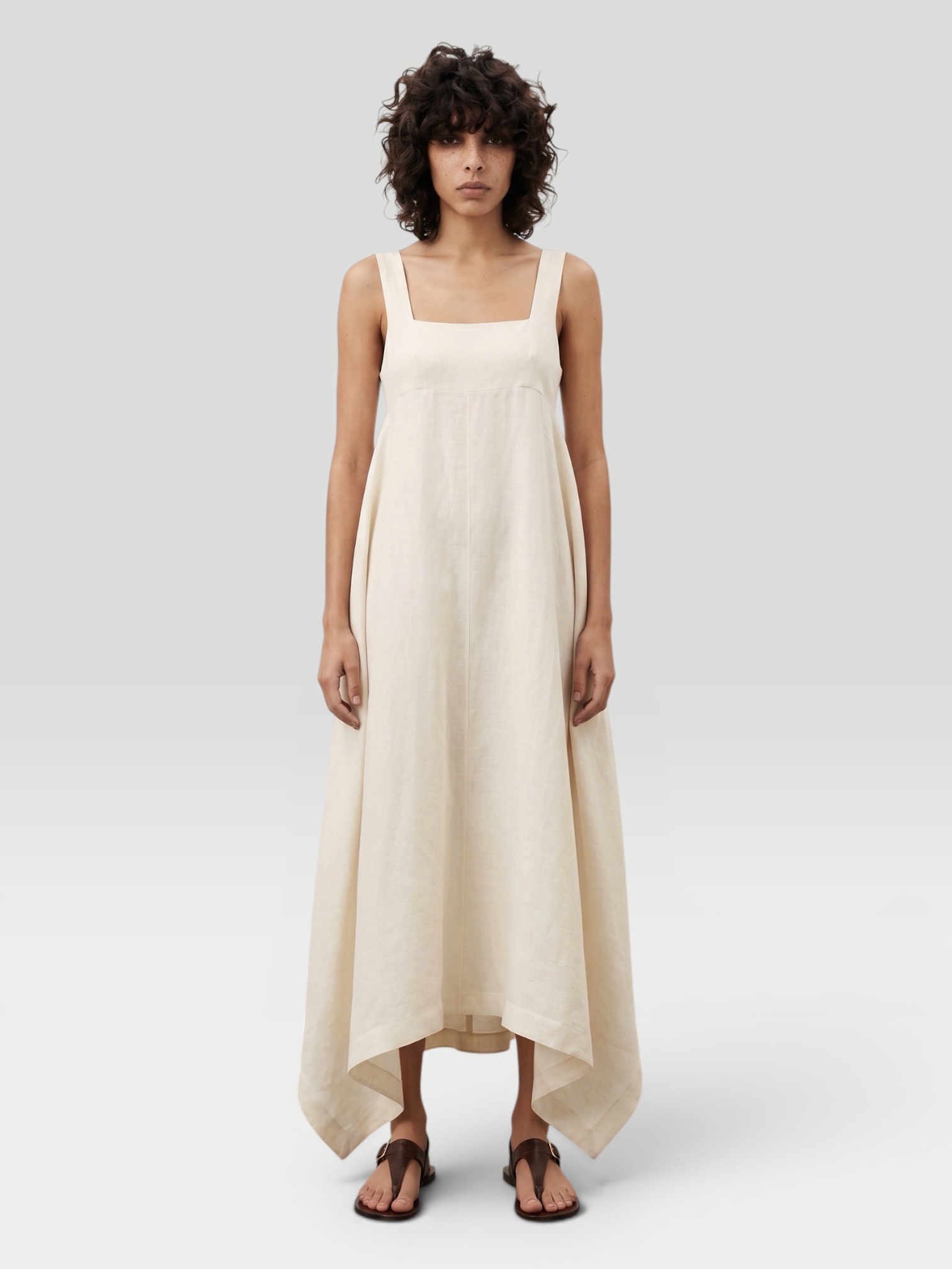 HEIRLOME Monica Dress in ivory, worn with Prada Noué Medium Cotton Macramé Bag. Styled by Sharon Lombardo for FDV Concierge.