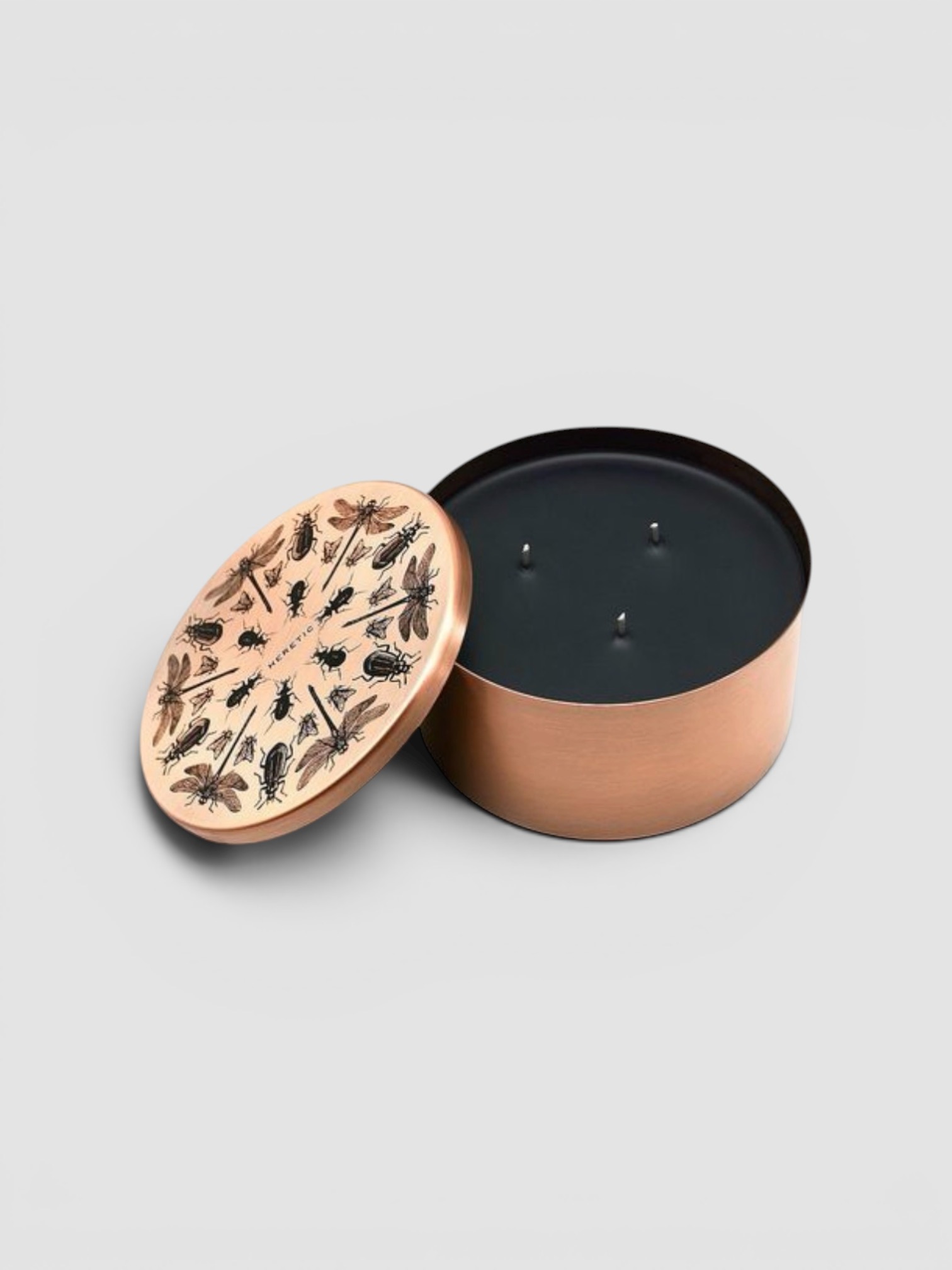 Heretic Parfum Entomologist Insect Repellent Candle in copper.