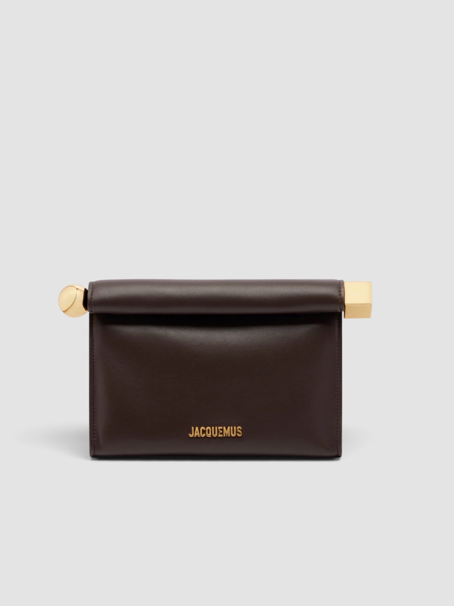 Jacquemus Rond Carré Small Leather Clutch in brown, worn with HEIRLOME Monica Dress. Styled by Sharon Lombardo for FDV Concierge.