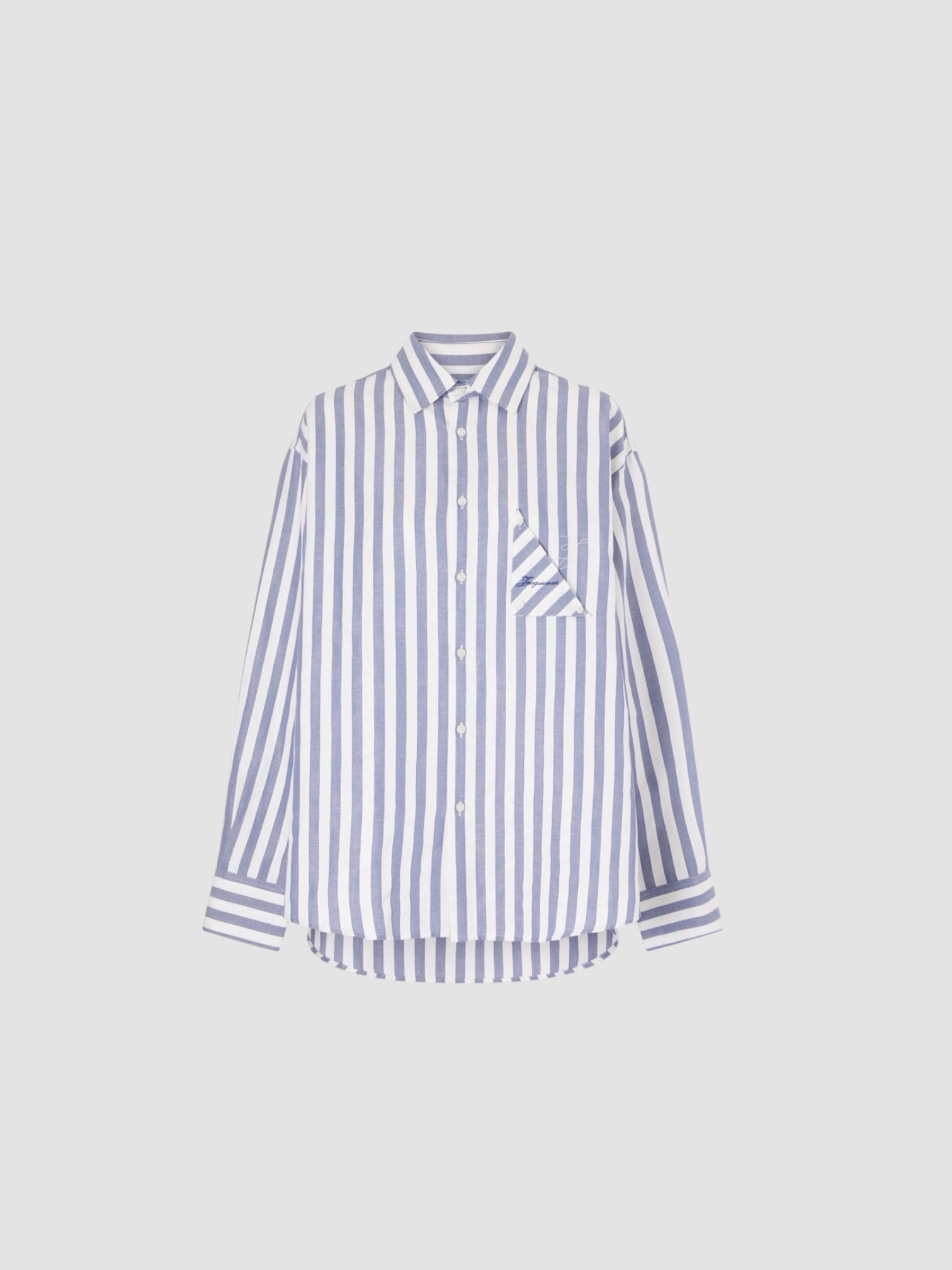 Jacquemus Striped Shirt in blue, worn with Jacquemus Le Marin High Rise Shorts, Bottega Veneta Small Onda Clutch, Neous Arneb 65 Sandals. Styled by Sharon Lombardo for FDV Concierge.