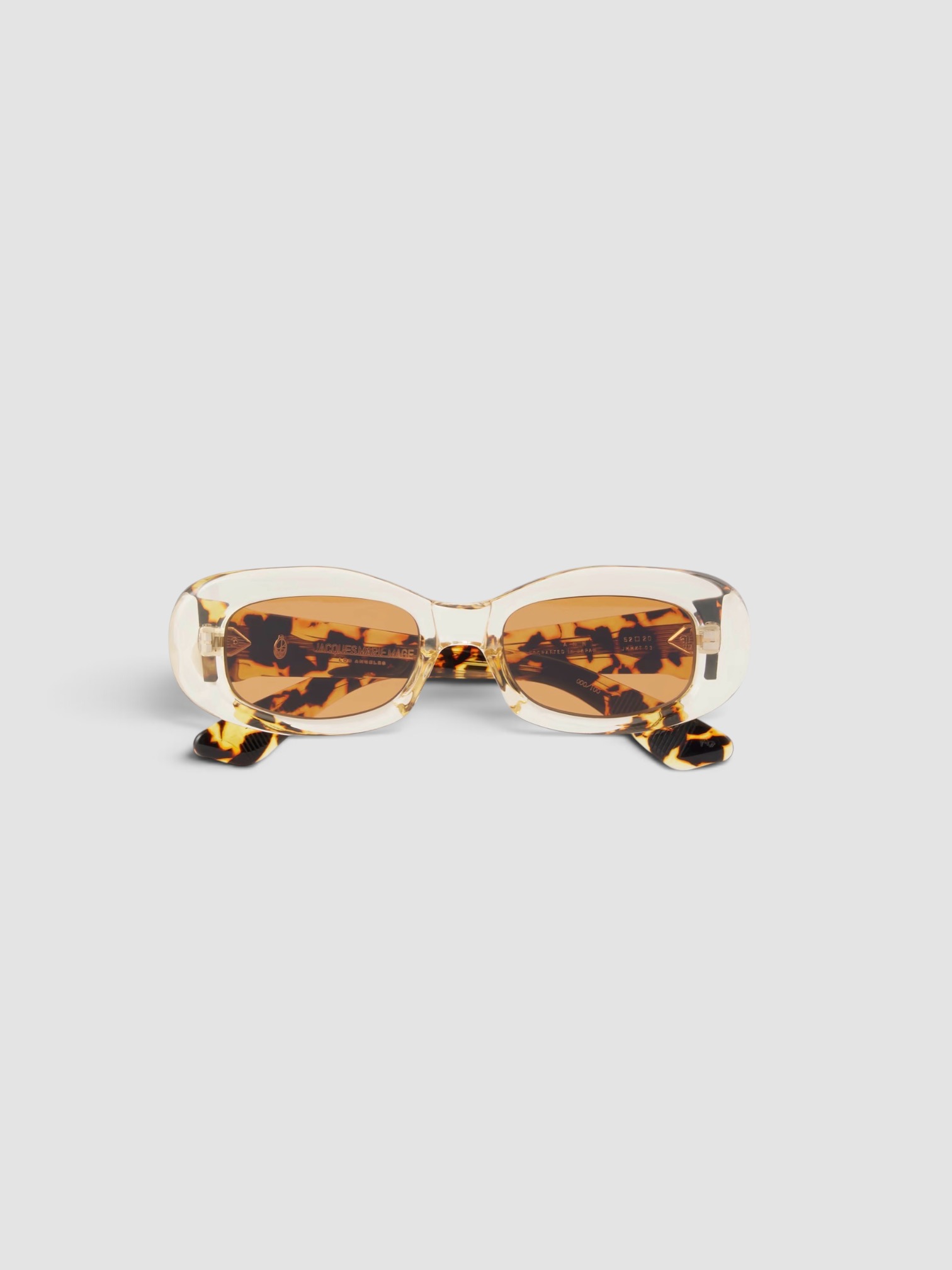 Jacques Marie Mage Ann Oval-Frame Tortoiseshell Acetate Sunglasses in cream.