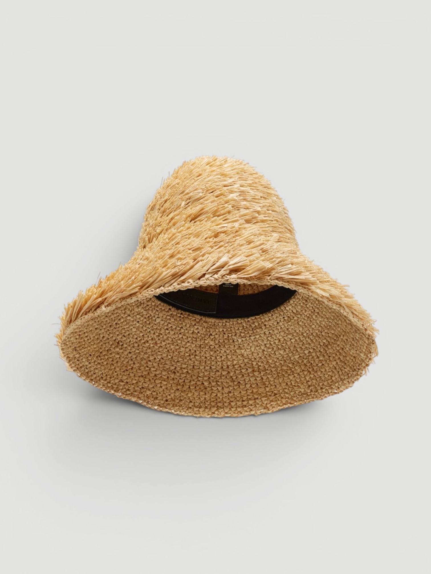 Janessa Leone Gabi Raffia Bucket Hat in brown.