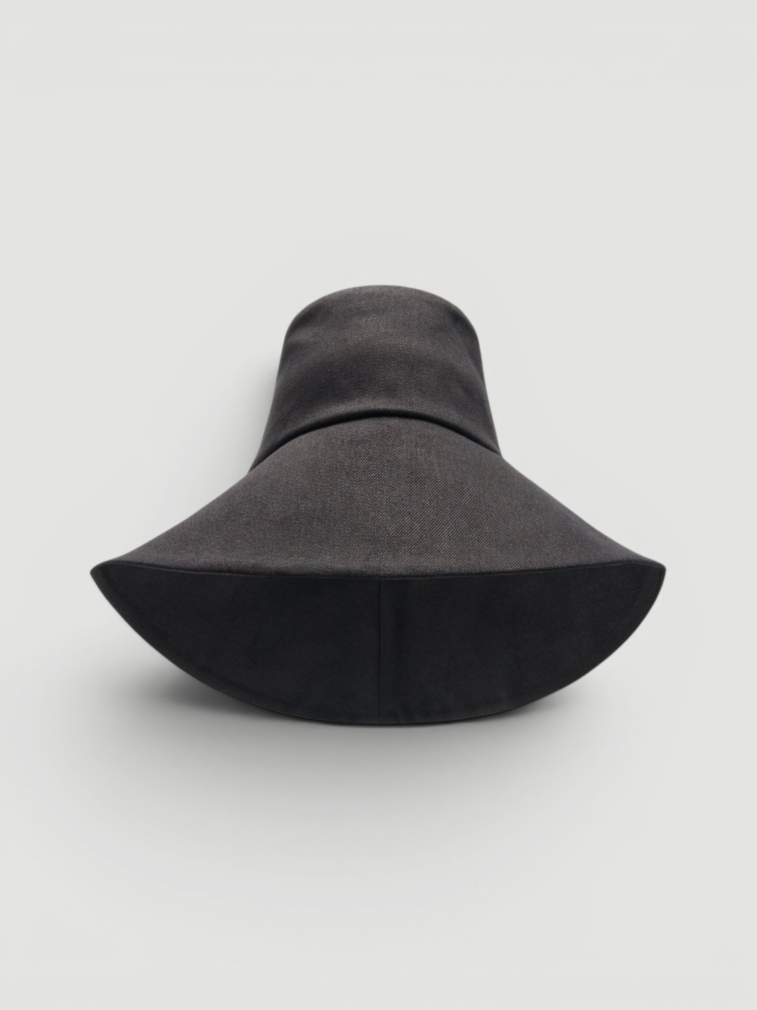 Janessa Leone Walker Cotton Bucket Hat in black.