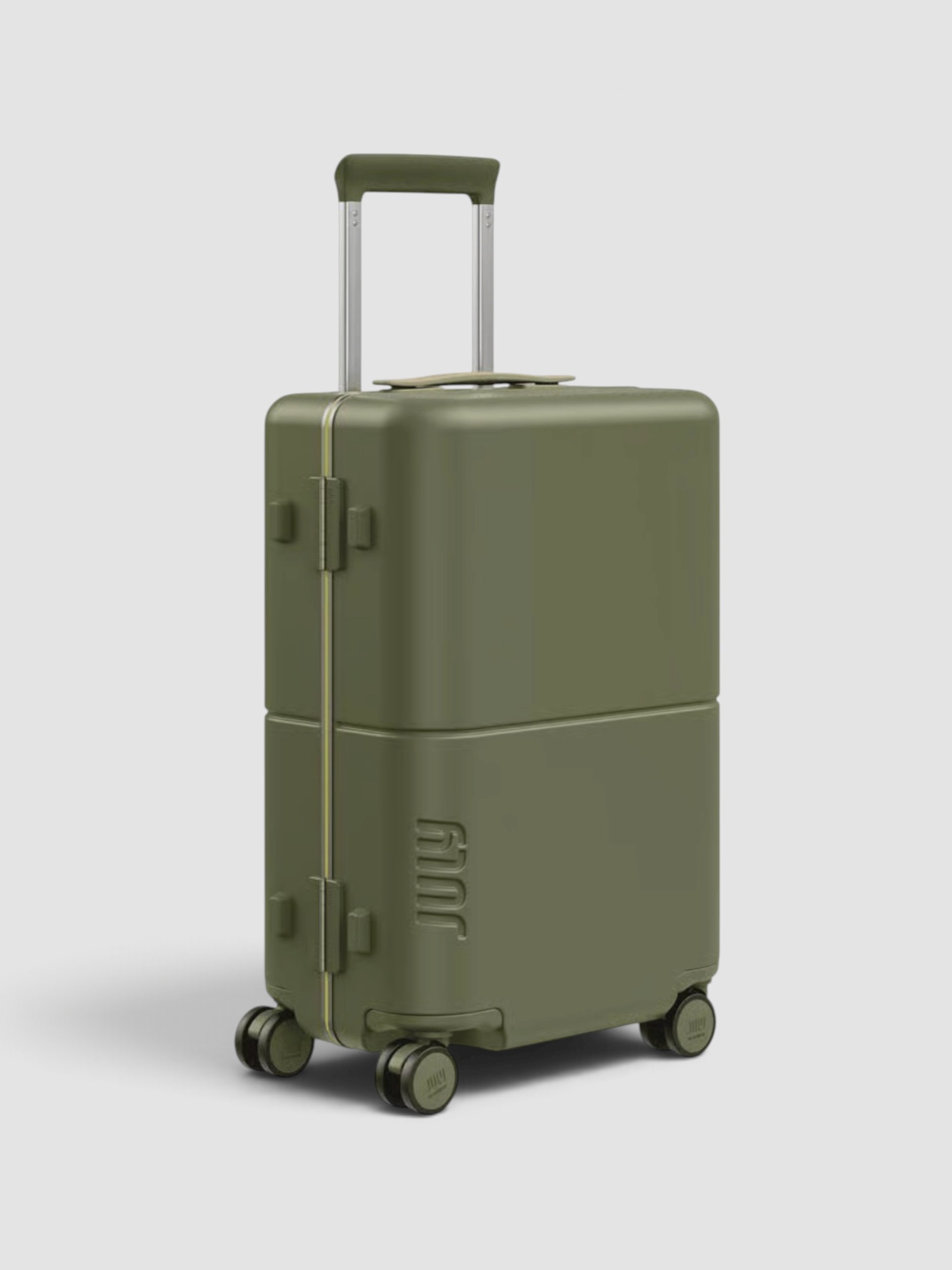 July Carry On Trunk in matte moss green.