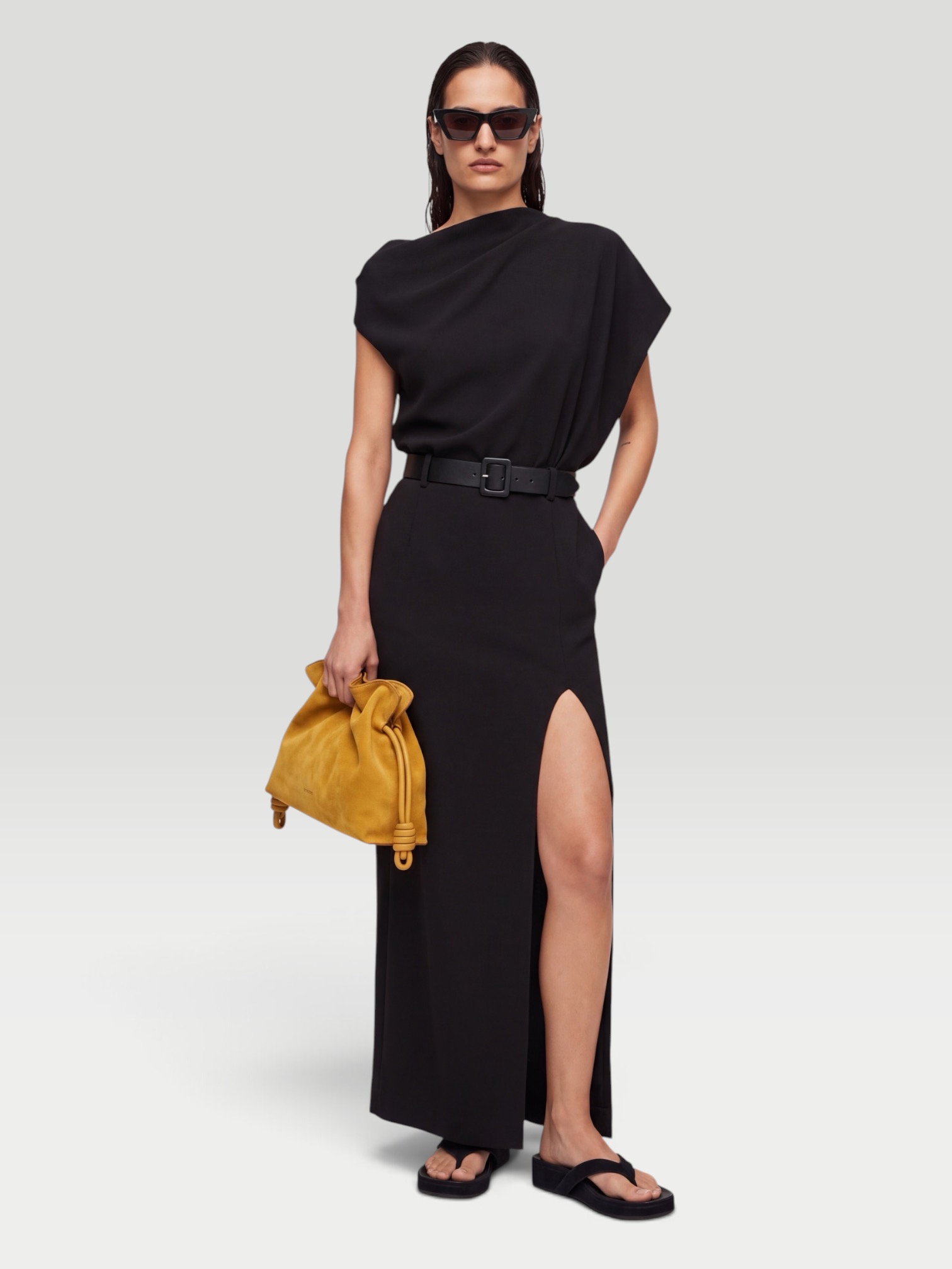Junya Watanabe Asymmetric Wool Maxi Dress in black. Styled by Sharon Lombardo for FDV Concierge.