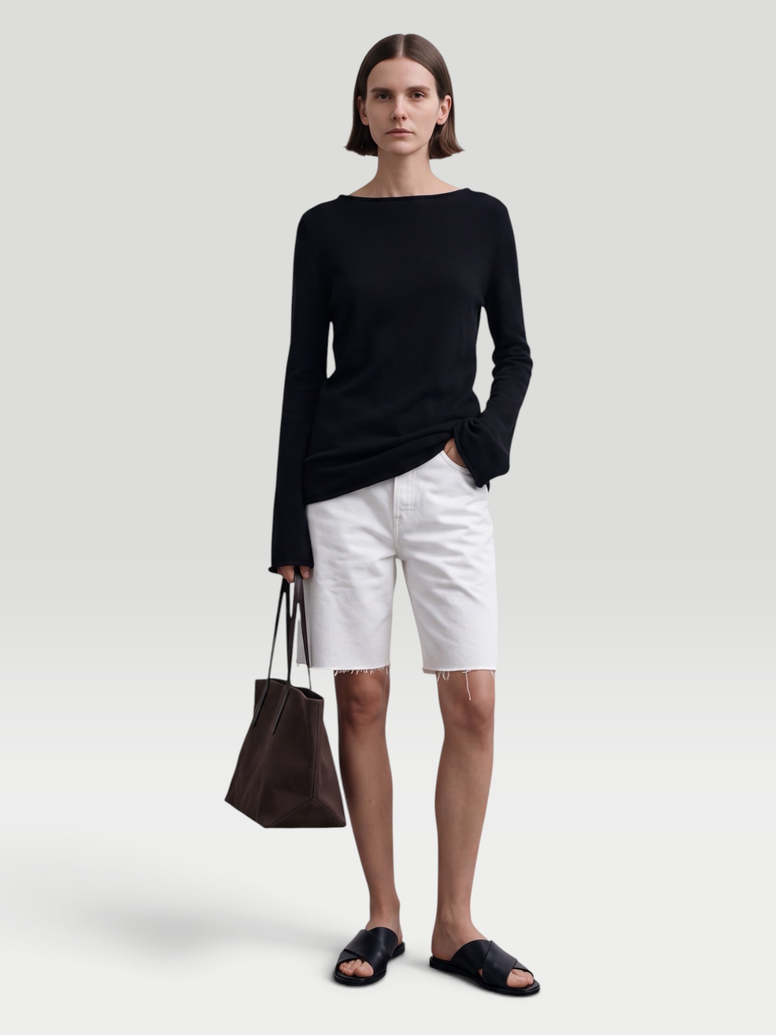 Kallmeyer Yasmin Tunic in Novelty Cotton Slub in black, worn with St. Agni Soft Jersey Slim Scoop Tank, Venroy Fleece Track Pant, Phoebe Philo Frizz Flip Flop, Leatherology Barrel Gym Bag, the journey. Styled by Sharon Lombardo for FDV Concierge.