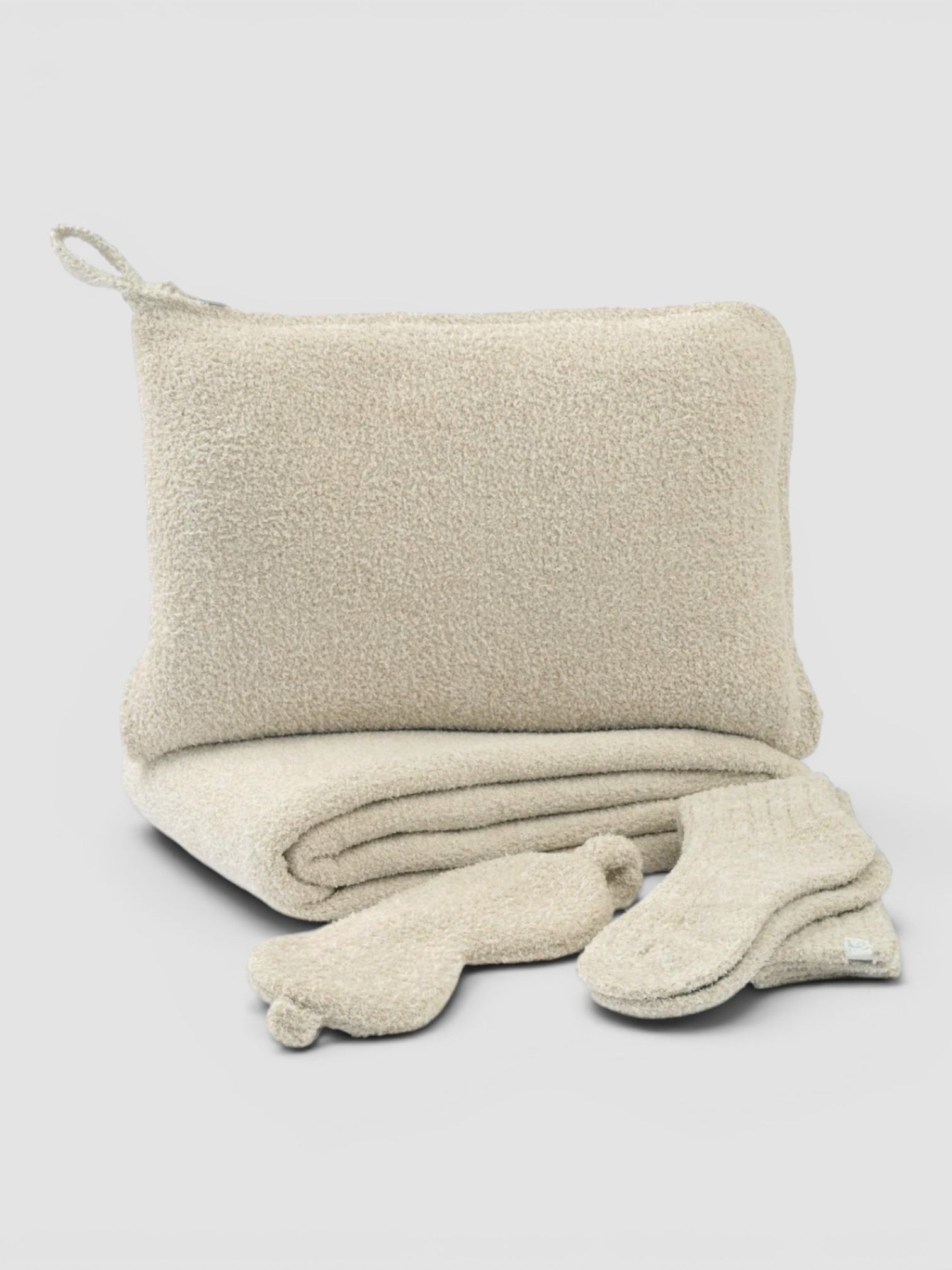 Kashwére Travel Blanket, Socks & Eye Mask Set in linen.