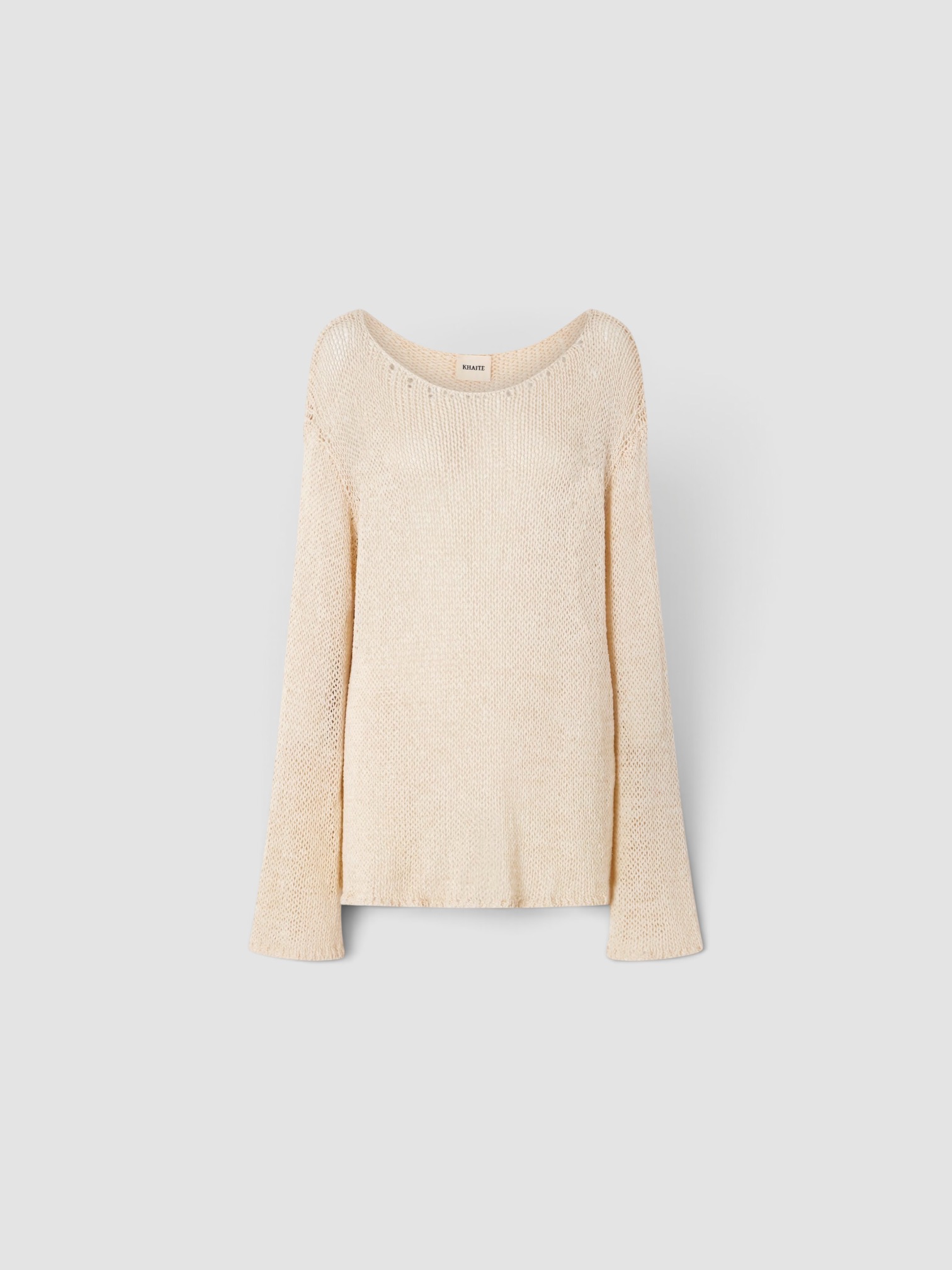 Khaite Davet Open-Knit Silk and Cotton-Blend Sweater in ivory. Styled by Sharon Lombardo for FDV Concierge.