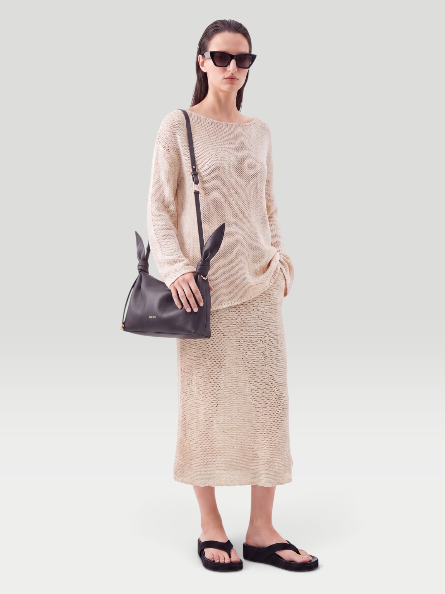 Khaite Davet Open-Knit Silk and Cotton-Blend Sweater in ivory. Styled by Sharon Lombardo for FDV Concierge.
