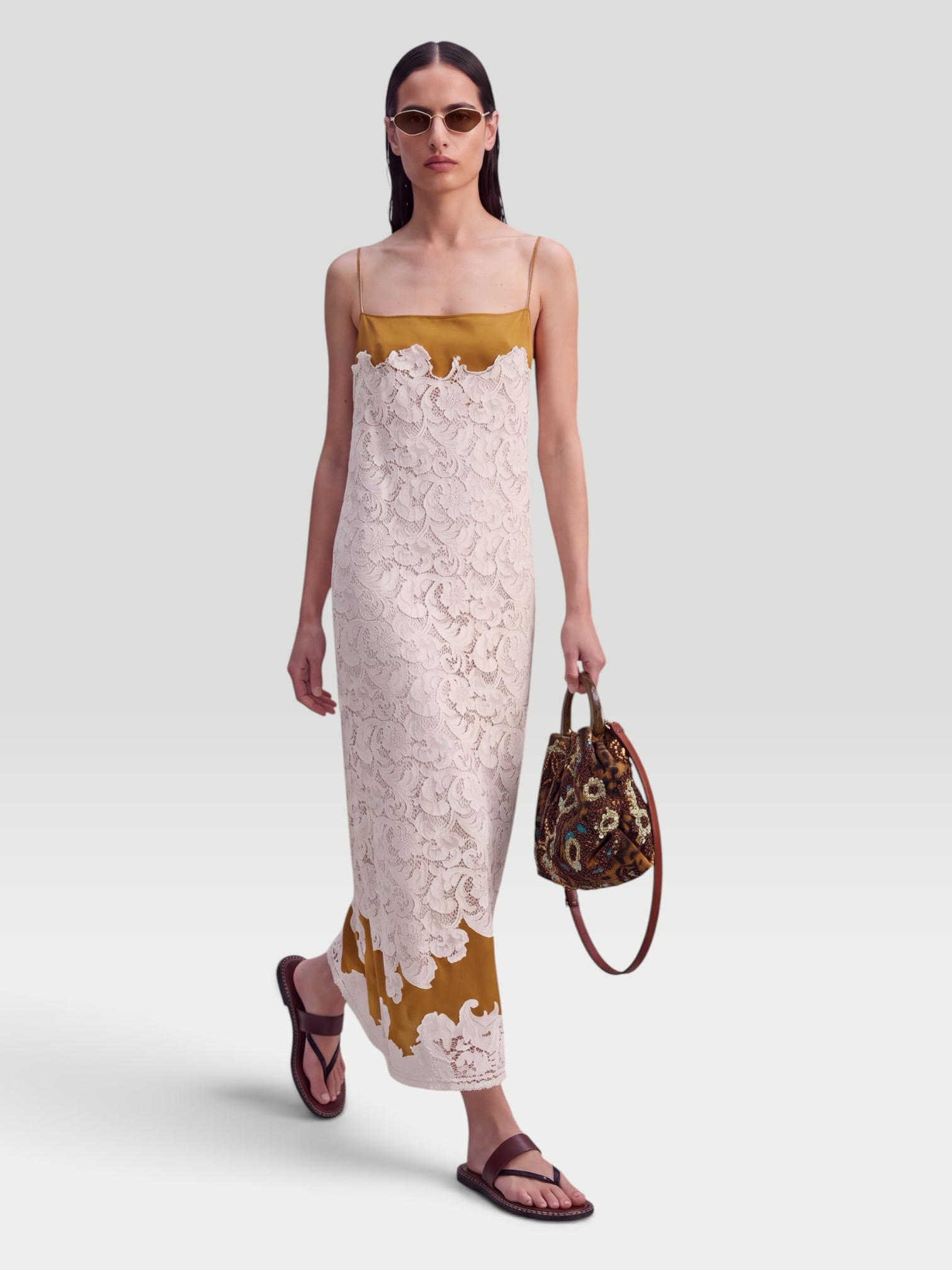 Khaite Nevis Lace Midi Dress in bronze. Styled by Sharon Lombardo for FDV Concierge.