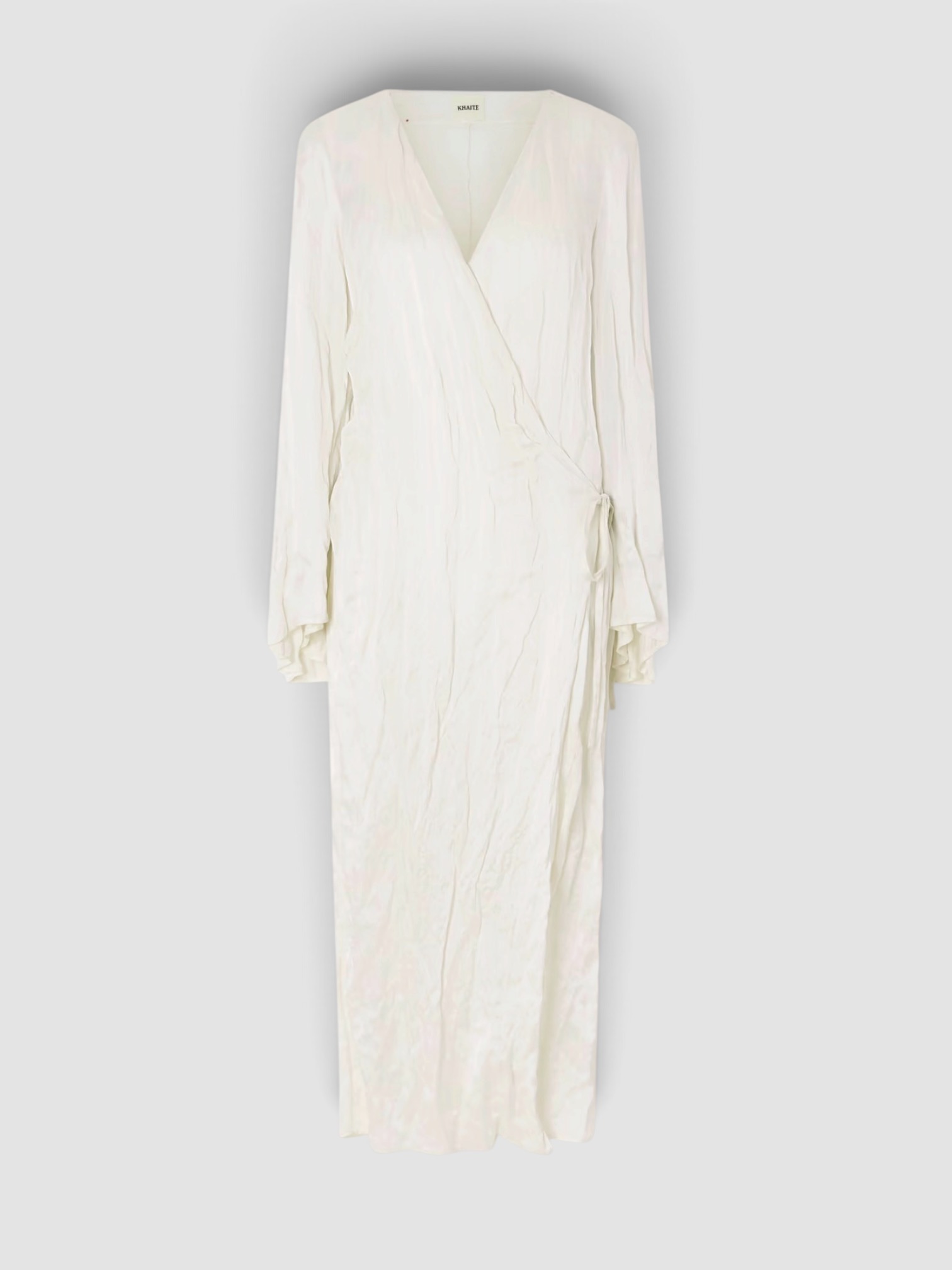 Khaite Rommi Crinkled-Voile Midi Wrap Dress in off-white. Styled by Sharon Lombardo for FDV Concierge.
